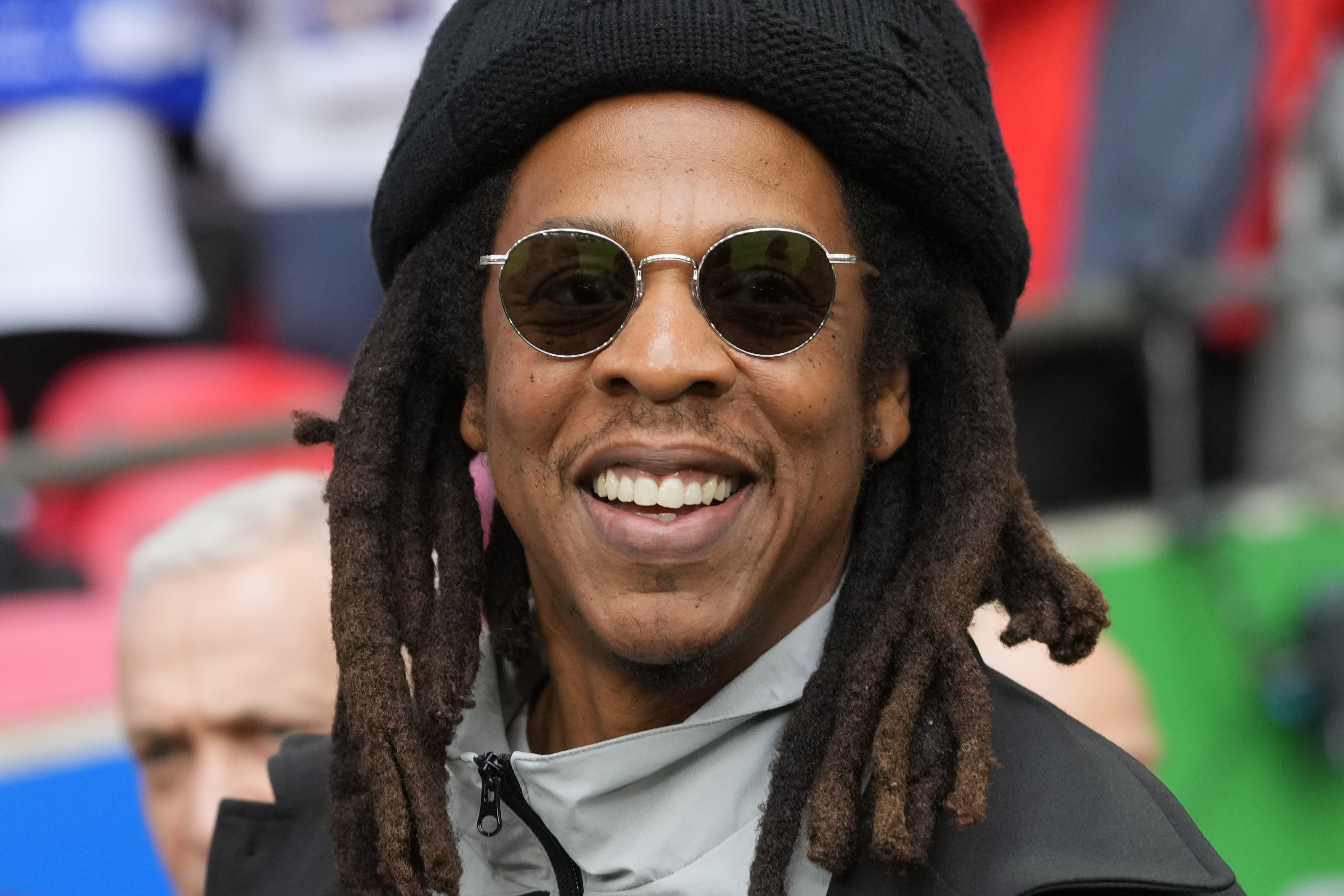 FILE - Jay-Z smiles ahead of the Champions League final soccer match between Borussia Dortmund and Real Madrid at Wembley stadium in London, Saturday, June 1, 2024. (AP Photo/Kirsty Wigglesworth, File)