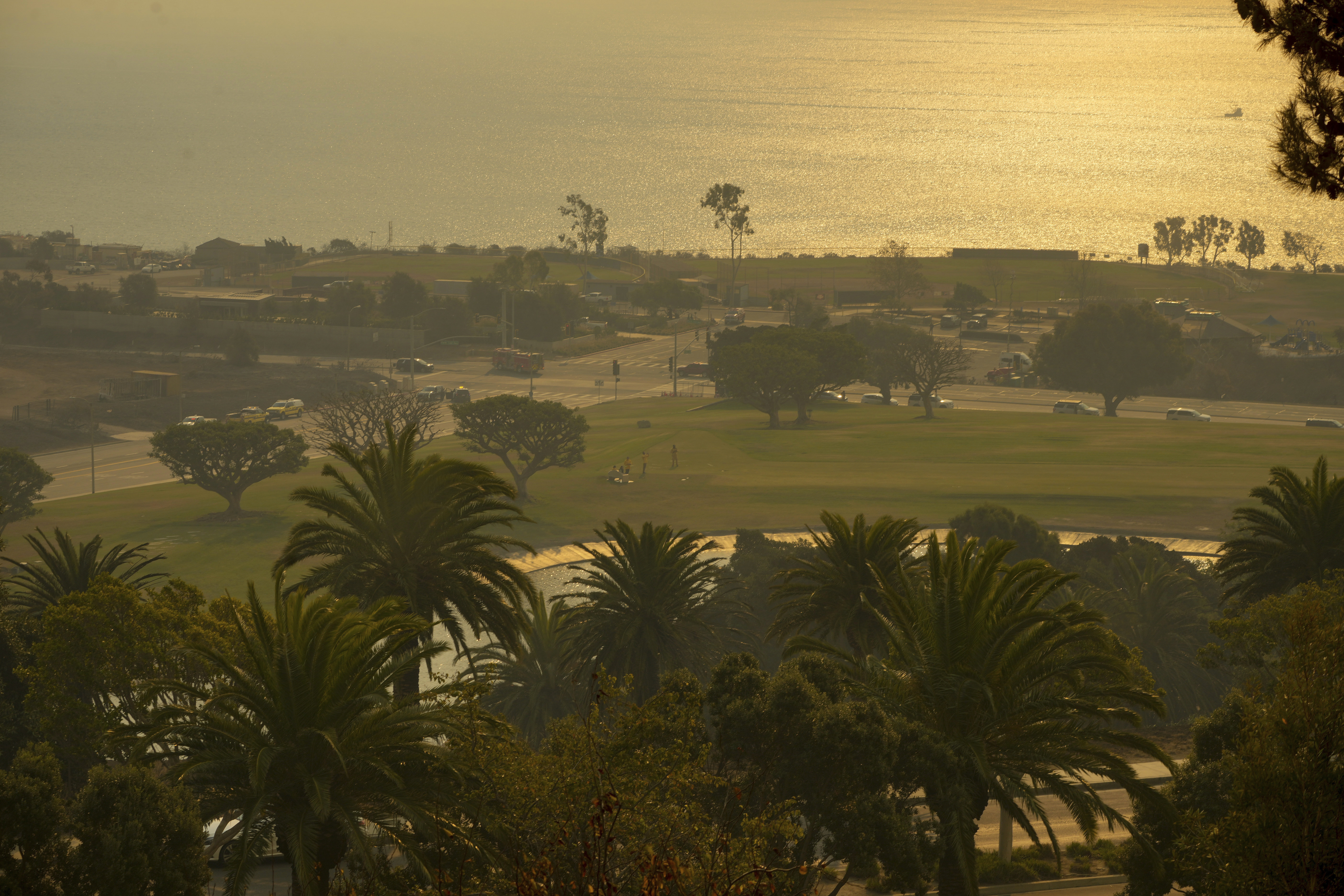 Smoke from the Franklin Fire fills the air on the Pepperdine University campus Tuesday, Dec. 10, 2024, in Malibu, Calif. (AP Photo/Damian Dovarganes)