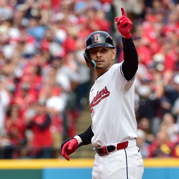 FILE - Cleveland Guardians' Andres Gimenez gestures after hitting a double in the eighth inning during Game 5 of baseball's American League Division Series against the Detroit Tigers, Oct. 12, 2024, in Cleveland. (AP Photo/Phil Long, File)