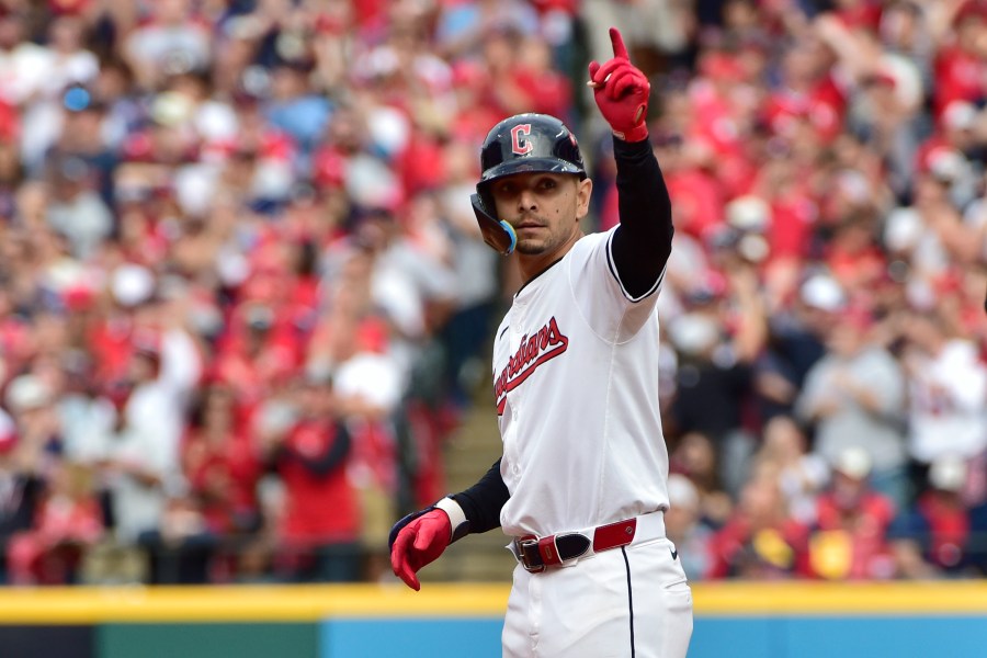 FILE - Cleveland Guardians' Andres Gimenez gestures after hitting a double in the eighth inning during Game 5 of baseball's American League Division Series against the Detroit Tigers, Oct. 12, 2024, in Cleveland. (AP Photo/Phil Long, File)