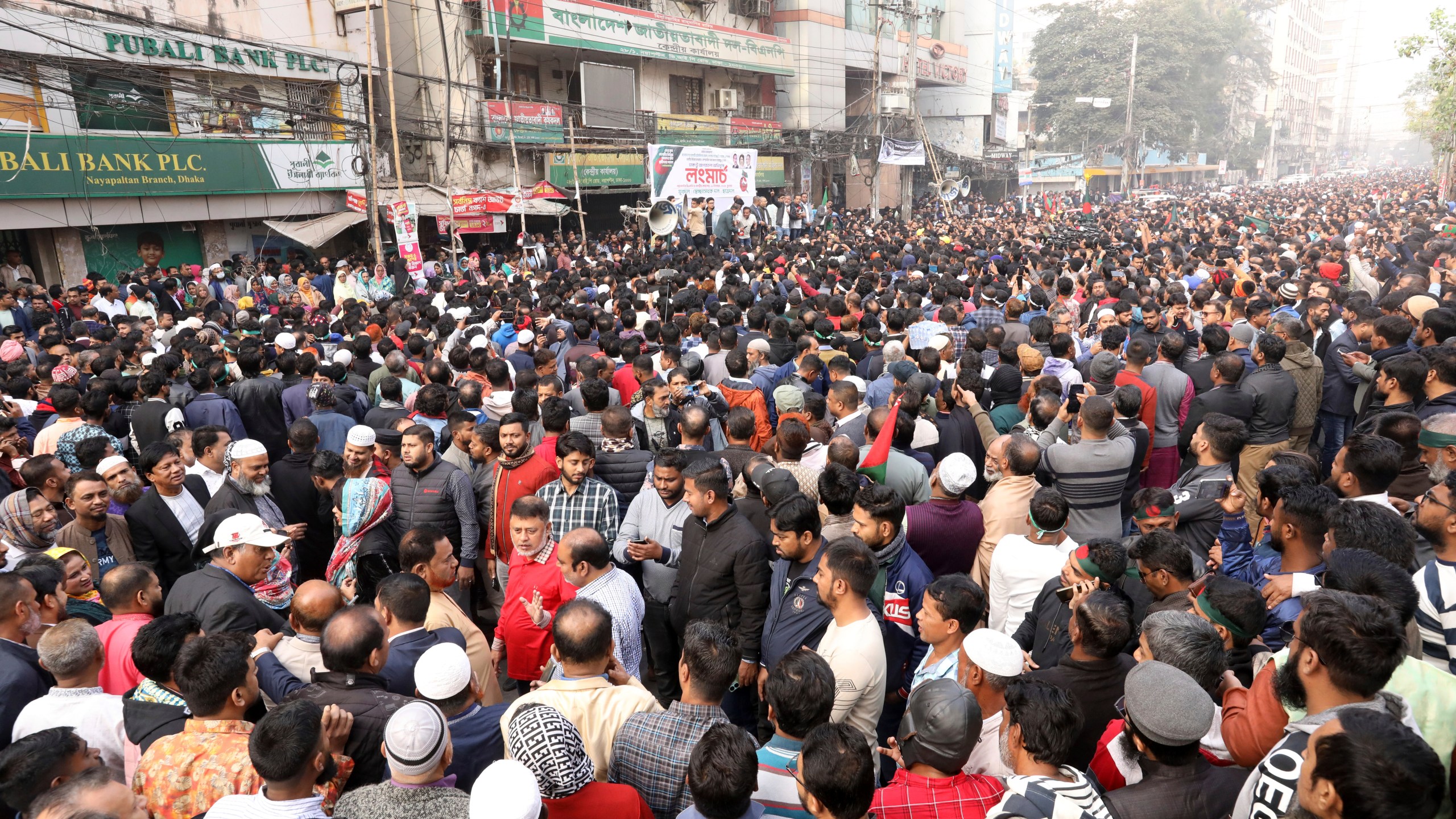 Supporters of Bangladesh's former Prime Minister Khaleda Zia and her Bangladesh Nationalist Party (BNP) denouncing attacks in India on a diplomatic mission and alleged desecration of Bangladeshi flags, participate in a protest in Dhaka, Bangladesh, Wednesday, Dec. 11, 2024. (AP Photo)