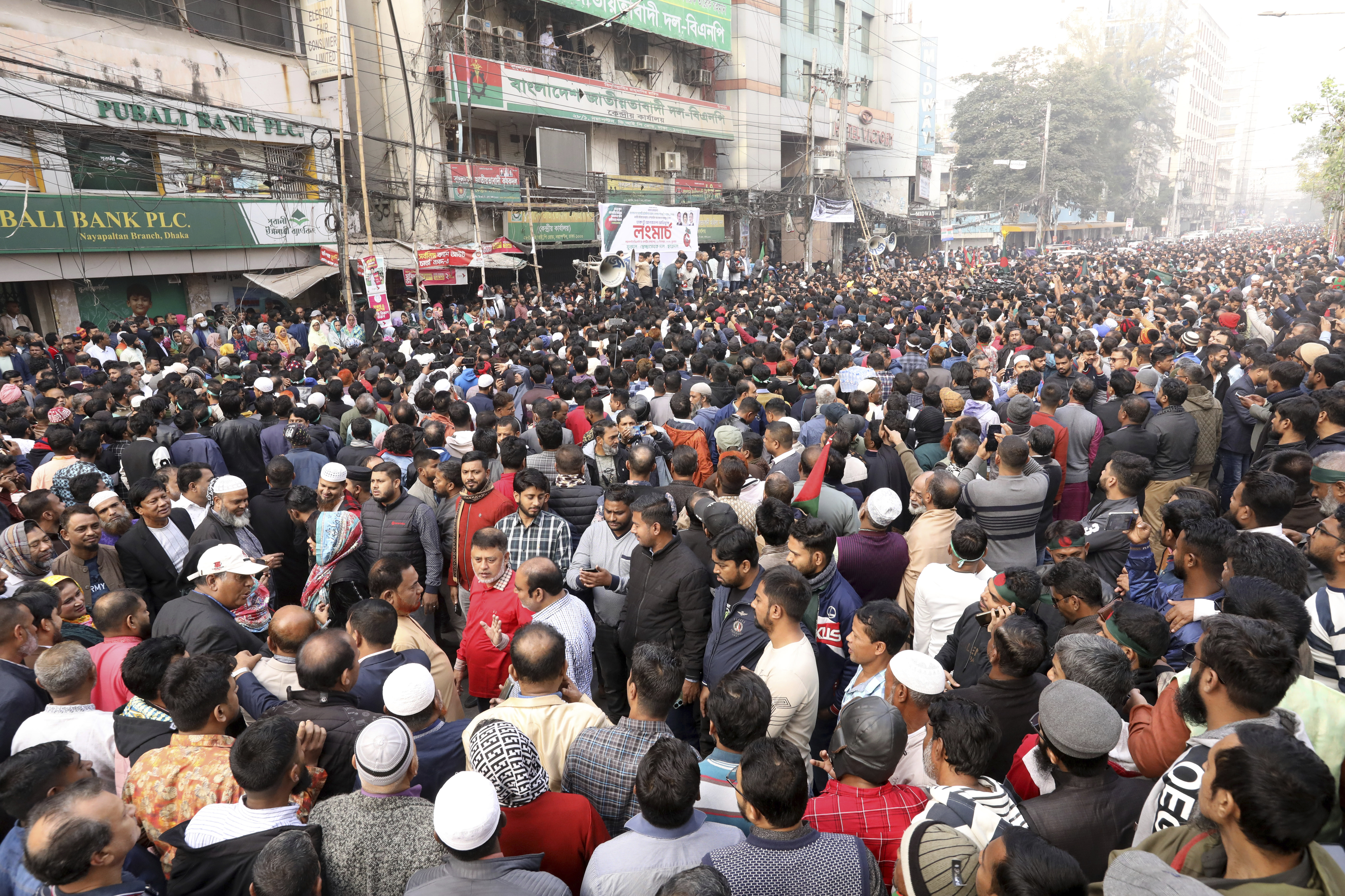 Supporters of Bangladesh's former Prime Minister Khaleda Zia and her Bangladesh Nationalist Party (BNP) denouncing attacks in India on a diplomatic mission and alleged desecration of Bangladeshi flags, participate in a protest in Dhaka, Bangladesh, Wednesday, Dec. 11, 2024. (AP Photo)