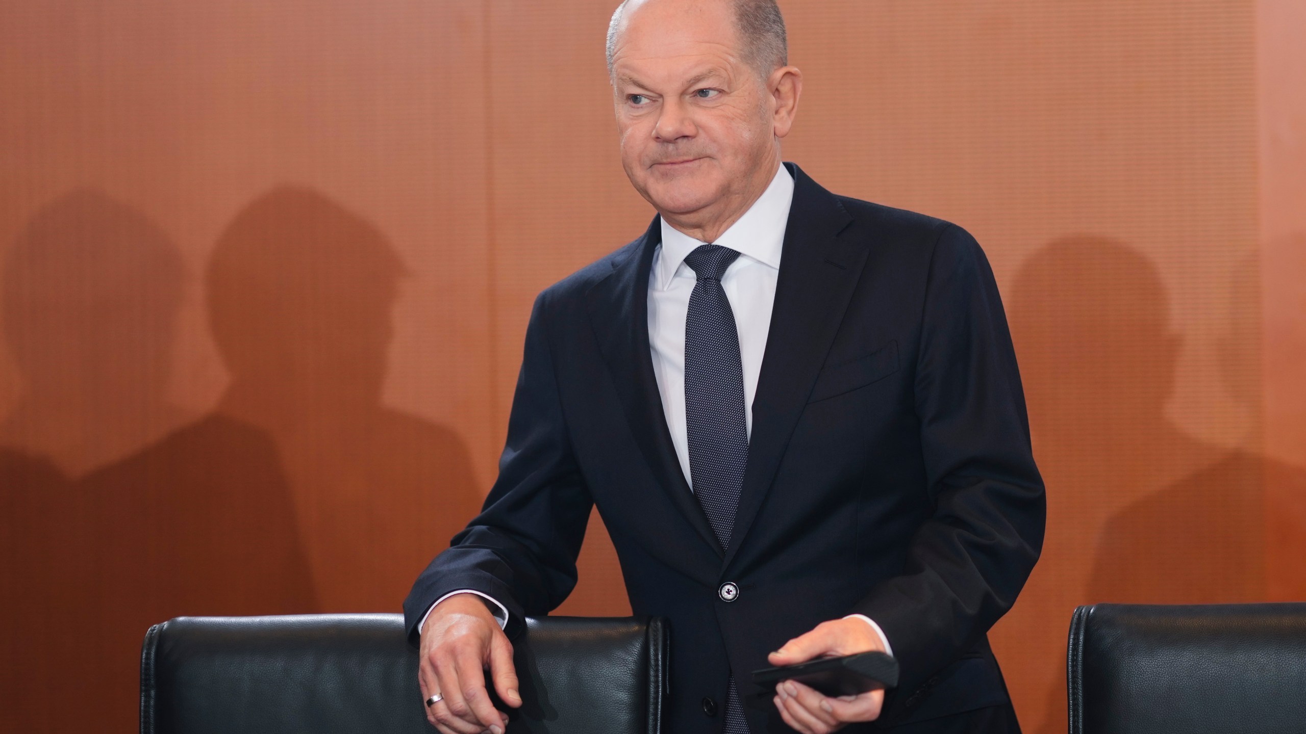 German Chancellor Olaf Scholz arrives for the cabinet meeting at the chancellery in Berlin, Germany, Wednesday, Dec. 11, 2024. (AP Photo/Markus Schreiber)