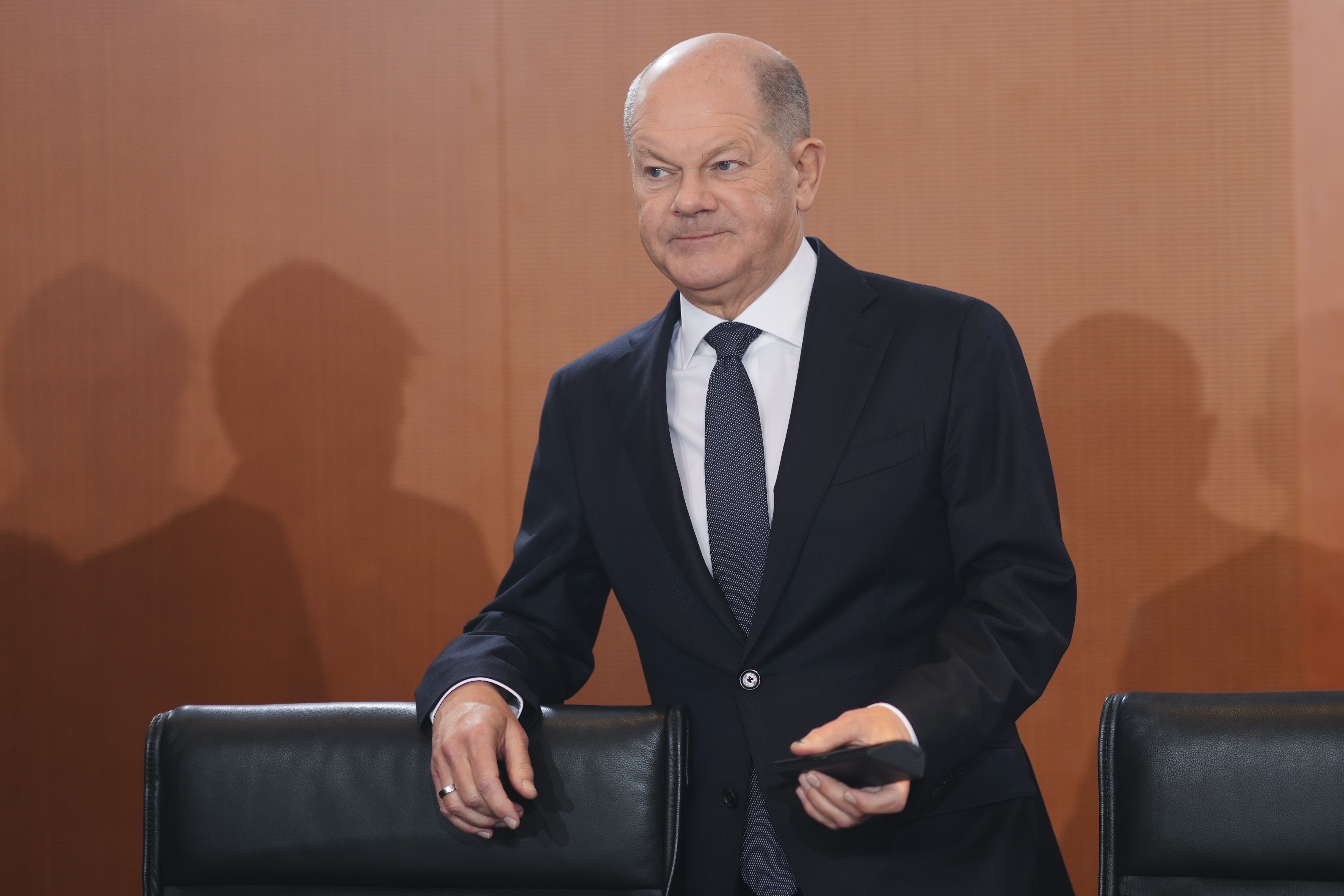 German Chancellor Olaf Scholz arrives for the cabinet meeting at the chancellery in Berlin, Germany, Wednesday, Dec. 11, 2024. (AP Photo/Markus Schreiber)