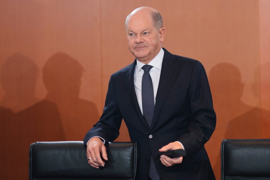 German Chancellor Olaf Scholz arrives for the cabinet meeting at the chancellery in Berlin, Germany, Wednesday, Dec. 11, 2024. (AP Photo/Markus Schreiber)