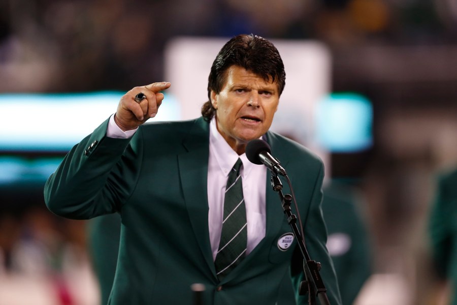 FILE - Former New York Jets defensive end Mark Gastineau gestures during the half time show of an NFL football game between the New York Jets and the Houston Texans Monday, Oct. 8, 2012, in East Rutherford, N.J. (AP Photo/Julio Cortez, File)