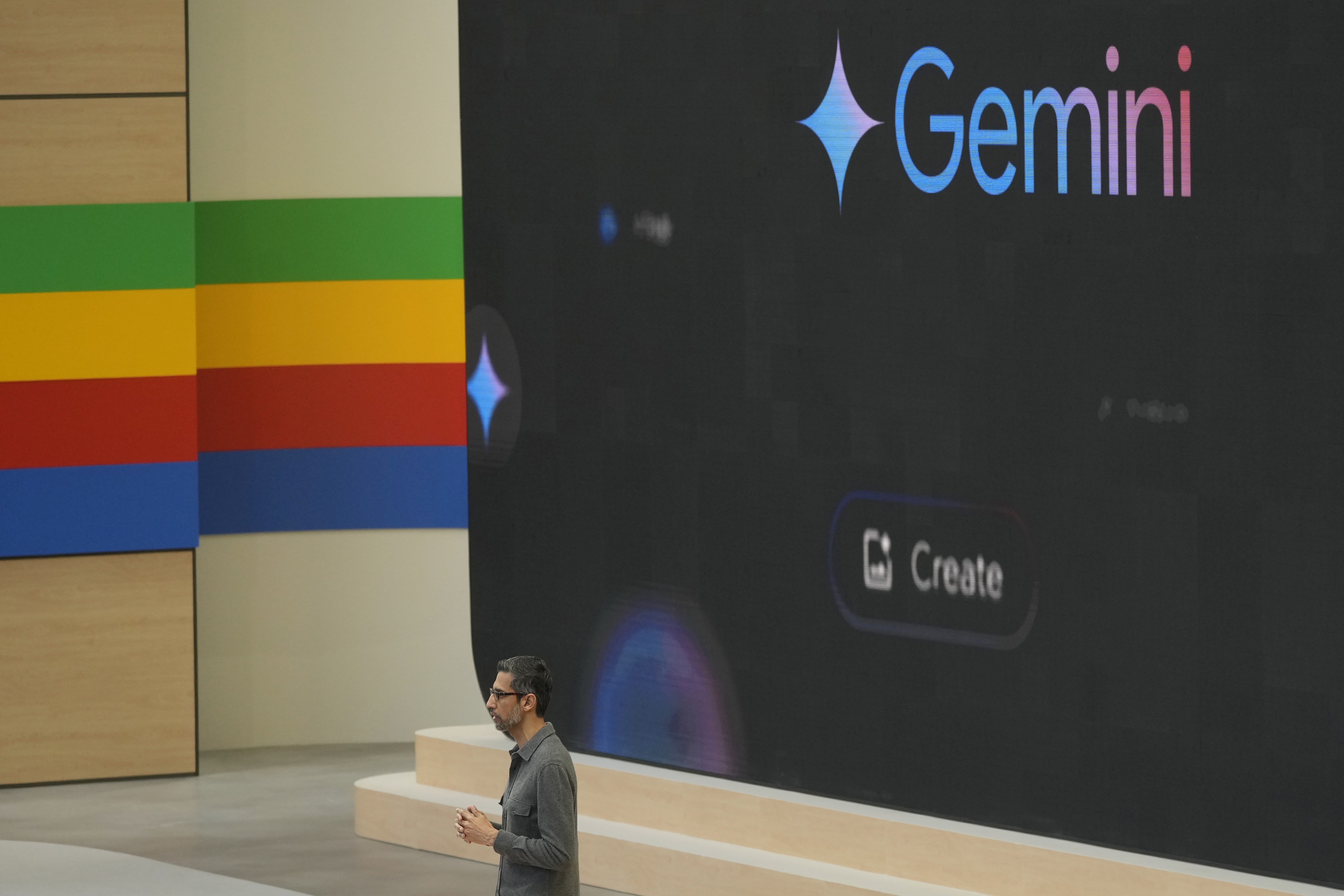 FILE - Alphabet CEO Sundar Pichai speaks about Gemini at a Google I/O event in Mountain View, Calif., May 14, 2024. (AP Photo/Jeff Chiu)