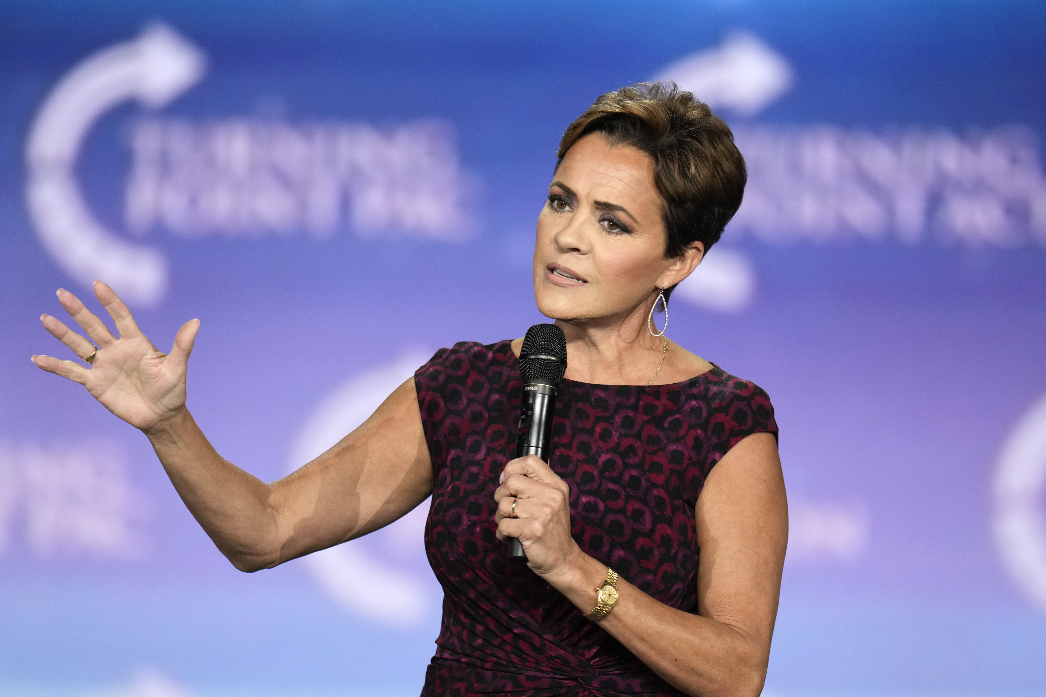 FILE - Kari Lake, Republican candidate for Senate in Arizona, speaks to supporters at a campaign event, Sept. 4, 2024, in Mesa, Ariz. (AP Photo/Ross D. Franklin, File)