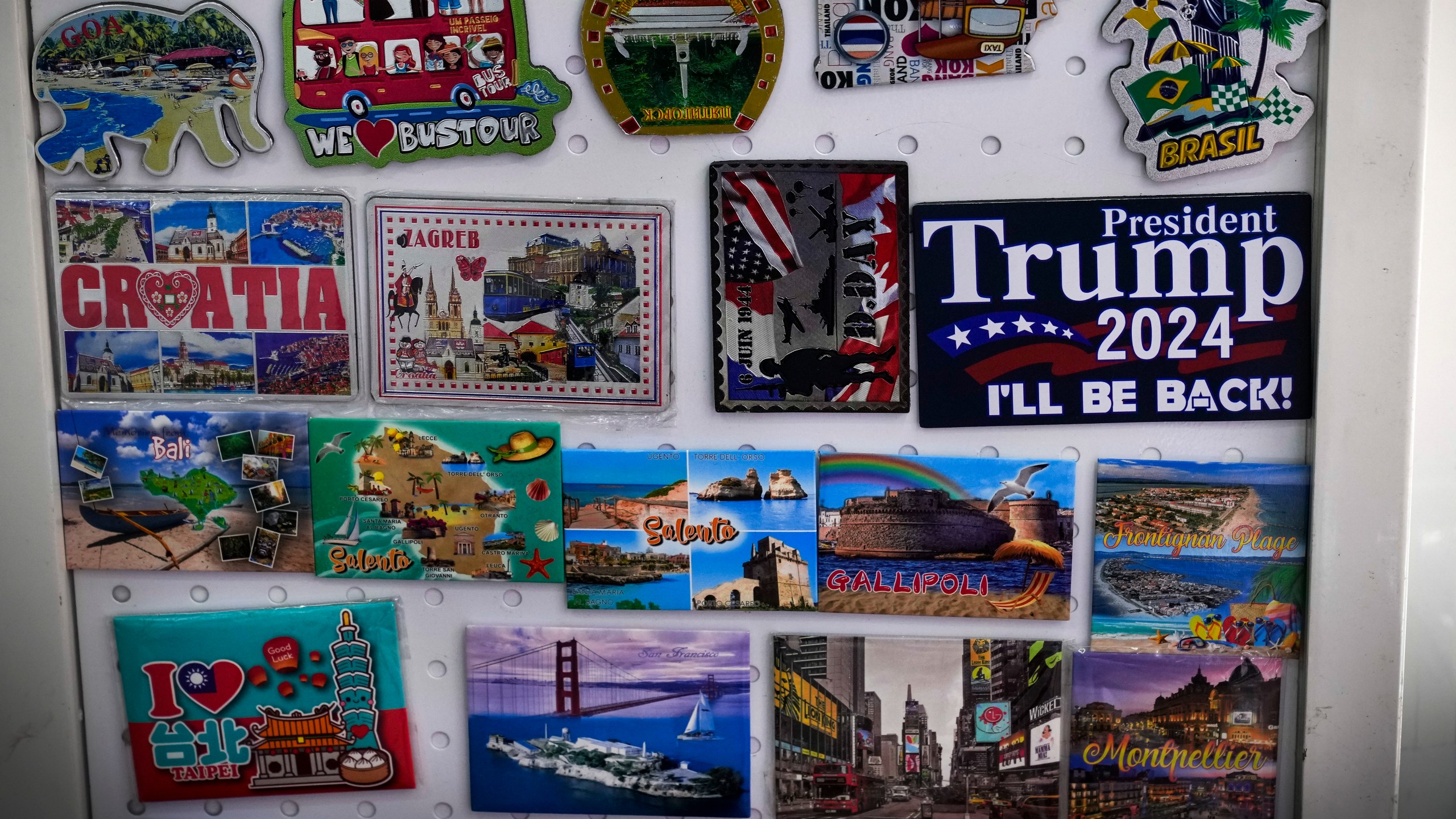 A fridge magnet that reads "President Donald Trump 2024" is displayed at a store at the Yiwu wholesale market in Yiwu, east China's Zhejiang province, Nov. 8, 2024. (AP Photo/Andy Wong)