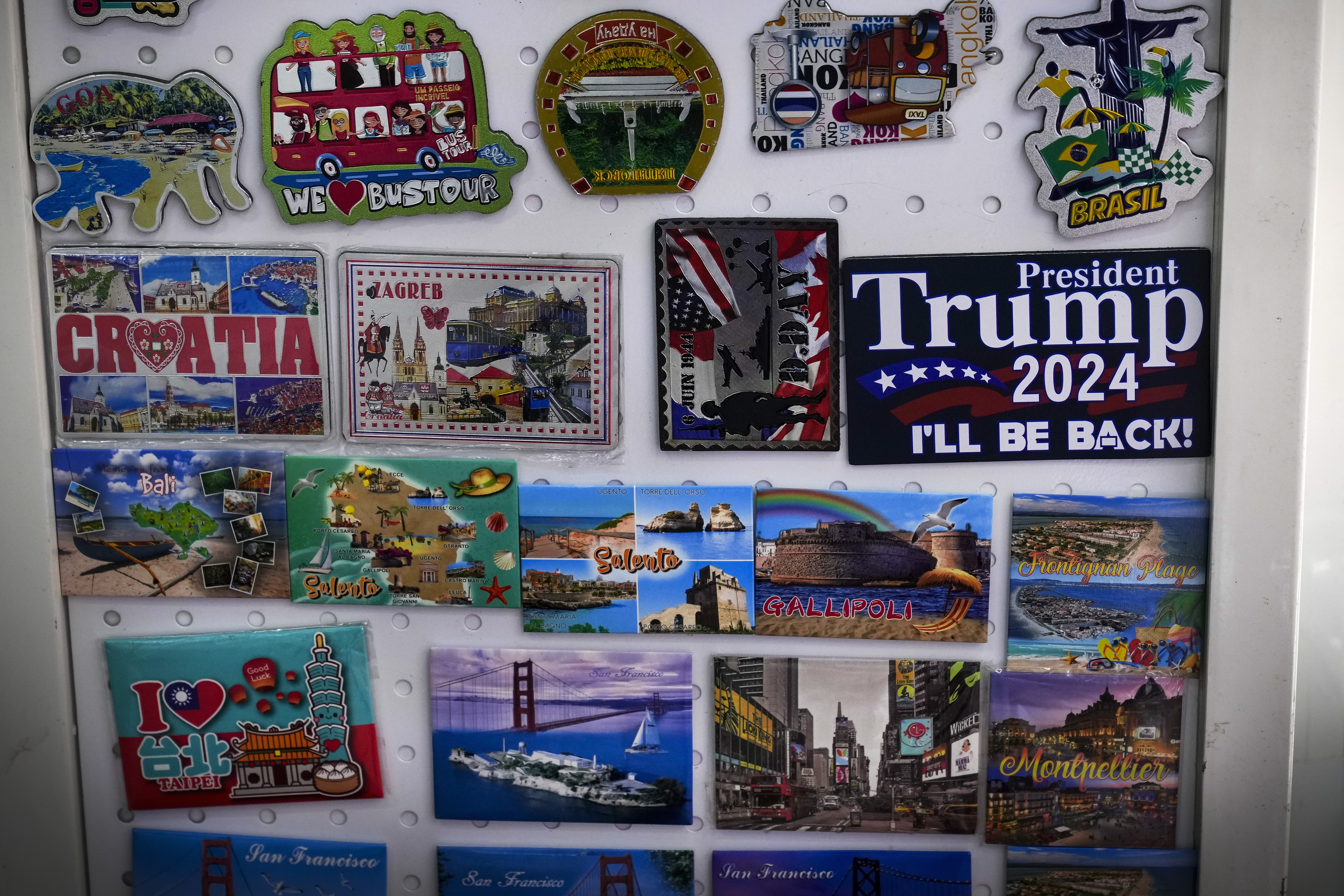 A fridge magnet that reads "President Donald Trump 2024" is displayed at a store at the Yiwu wholesale market in Yiwu, east China's Zhejiang province, Nov. 8, 2024. (AP Photo/Andy Wong)