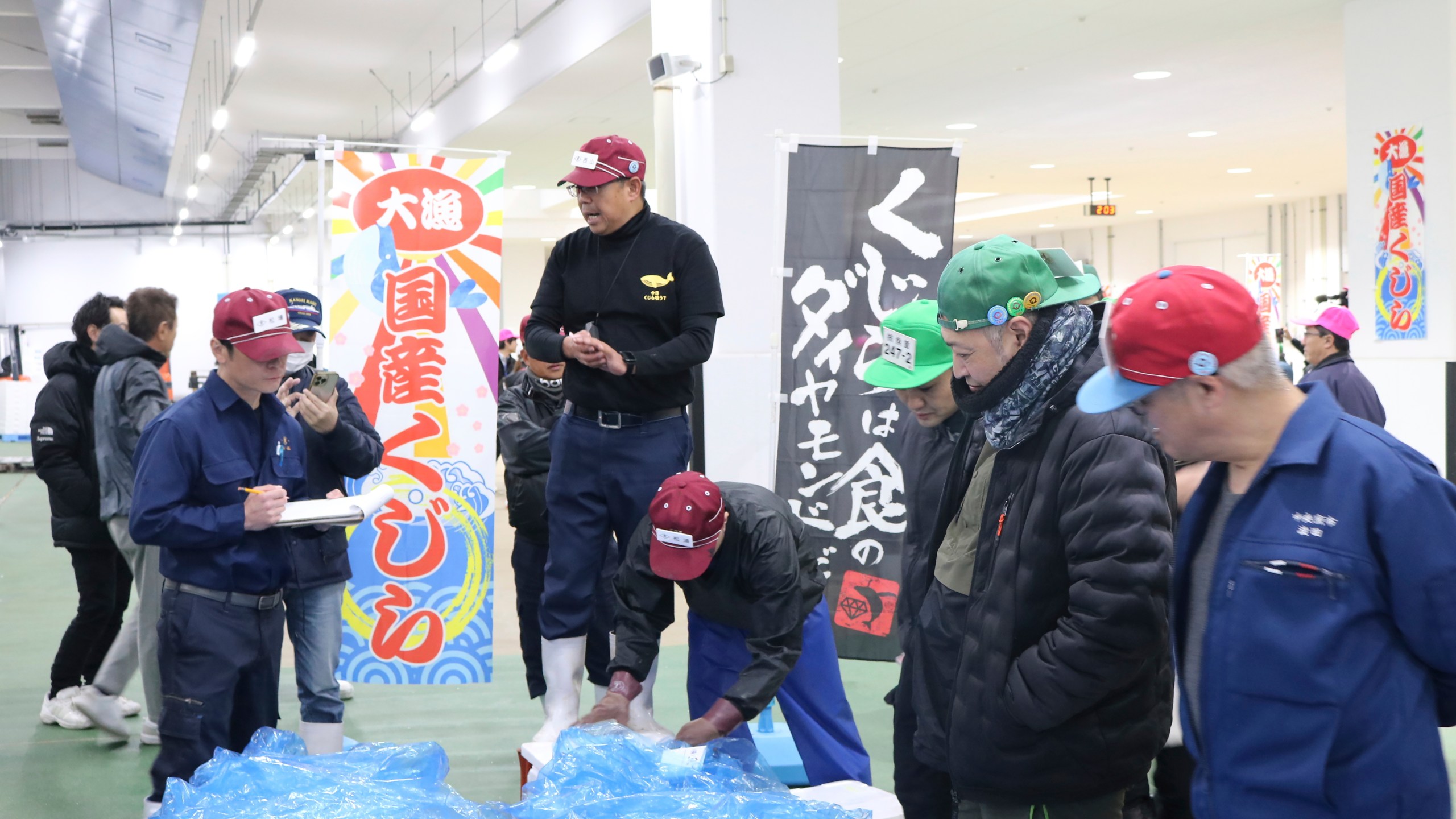 This photo released by Shimonoseki City, Agriculture, Forestry and Fisheries Maintenance Division shows an auction selling fresh meat of fin whales at a fish market in Shimonoseki, Yamaguchi prefecture, southern Japan Thursday, Dec. 12, 2024. (Shimonoseki City, Agriculture, Forestry and Fisheries Maintenance Division via AP)