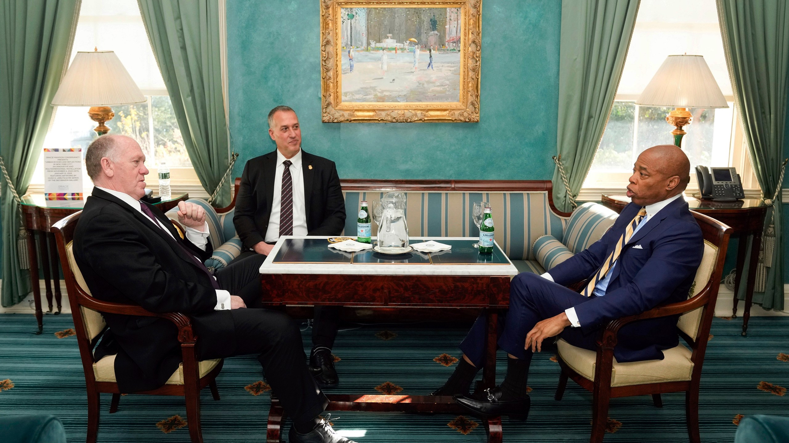 This image provided by the Office of the New York Mayor shows New York Mayor Eric Adams, right, meeting with President-elect Donald Trump's incoming "border czar" Tom Homan, left, and President Joe Biden's Department of Homeland Security Official Kenneth Genalo at Gracie Mansion, in New York, Thursday, Dec. 12, 2024. (Mayoral Photography Office/Michael Appleton via AP)