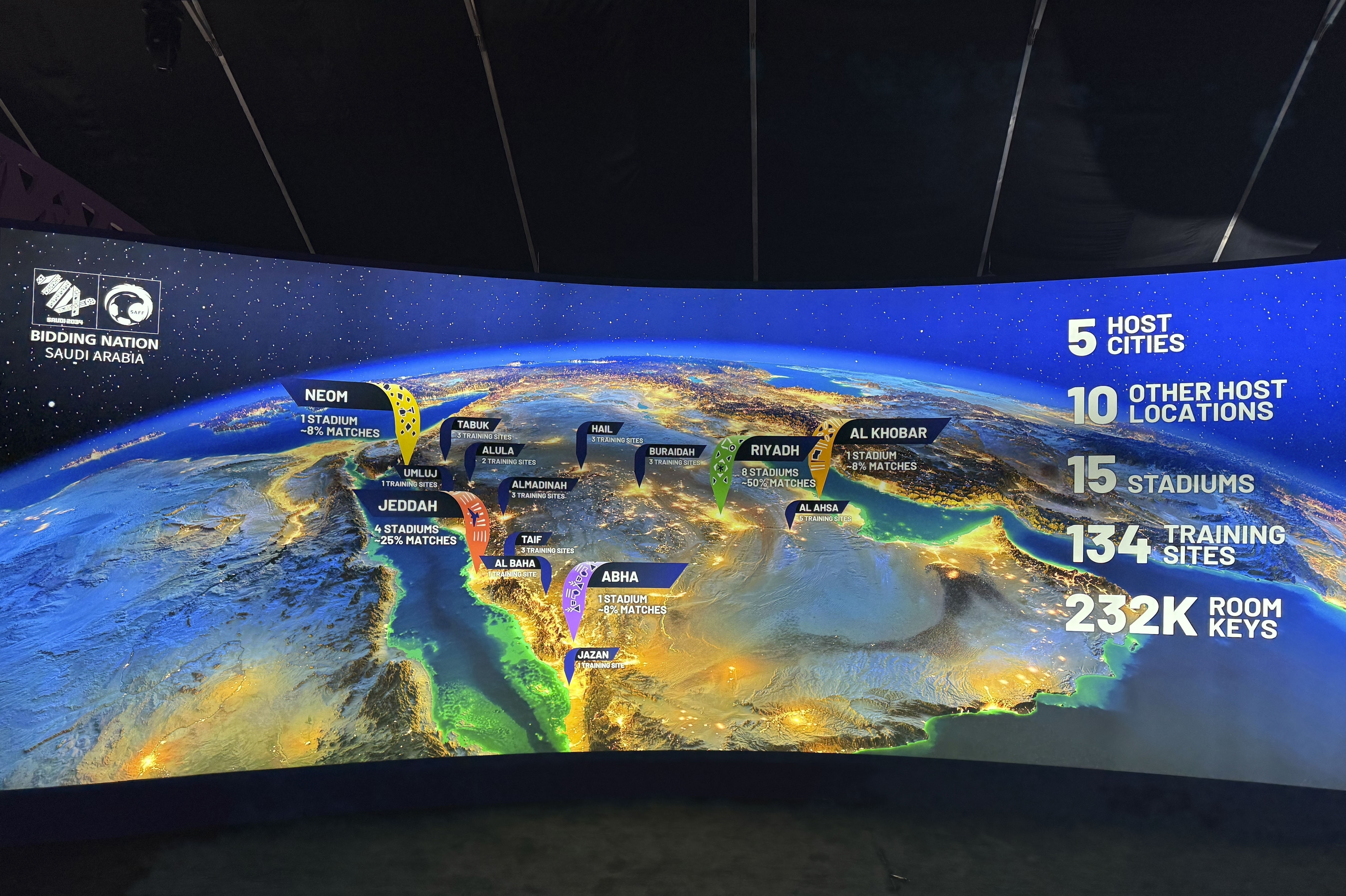 FILE - A map at the Saudi Arabia World Cup bid exhibition in Riyadh, Saudi Arabia, Wednesday Dec. 11, 2024, shows the proposed host cities and venues for the 2034 World Cup. (AP Photo/Baraa Anwer, File)