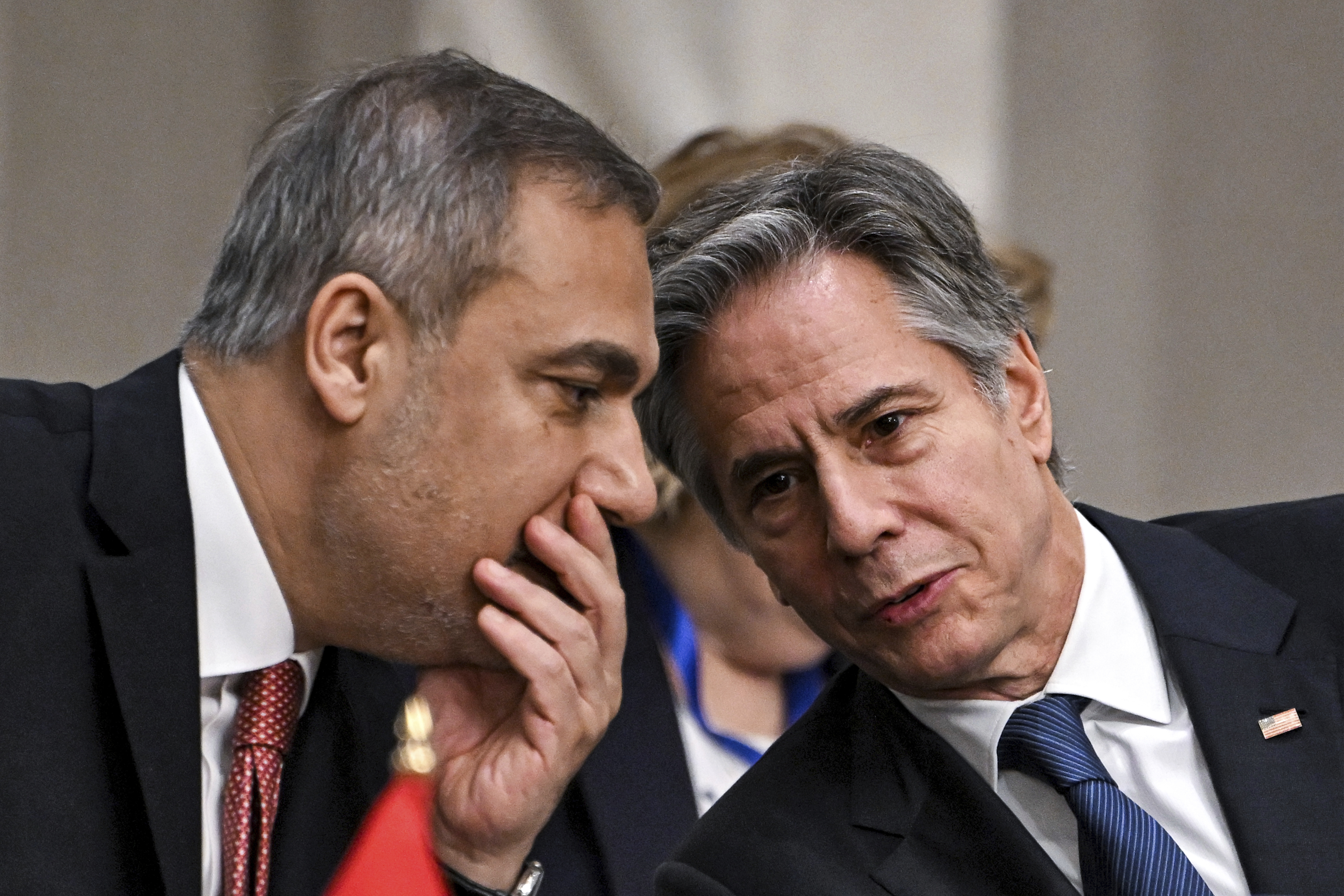 Turkey's Foreign Minister Hakan Fidan, left, speaks with US Secretary of State Antony Blinken during a meeting with the foreign ministers of the Arab Contact Group on Syria in Jordan's southern Red Sea coastal city of Aqaba, Saturday Dec. 14, 2024. (Andrew Caballero-Reynolds/Pool via AP)