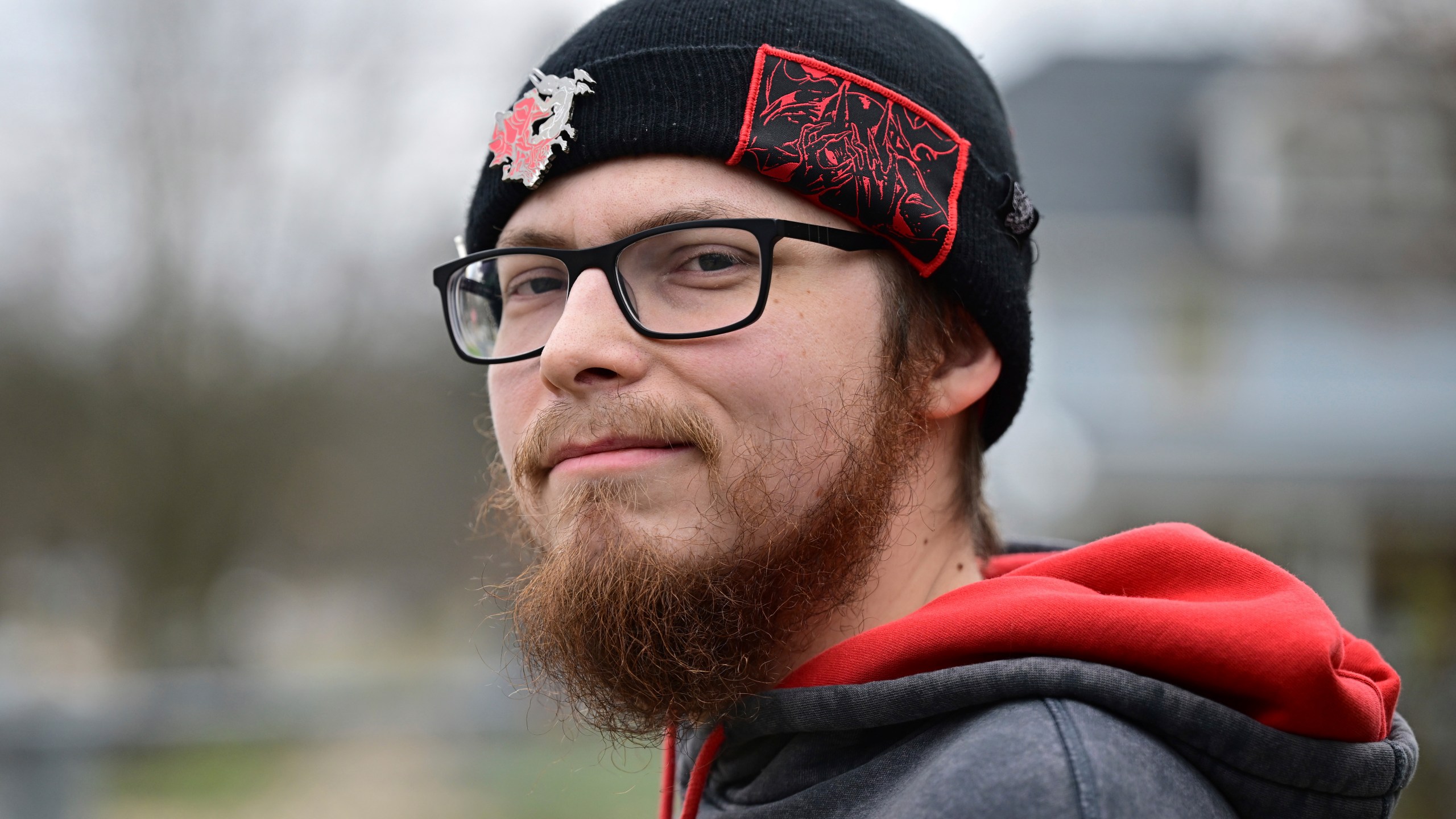 Nicholas Fontaine poses for a portrait outside his home in Akron, Ohio, Tuesday, Dec. 3, 2024. Fontaine is charged with one count of illegal voting. (AP Photo/David Dermer)