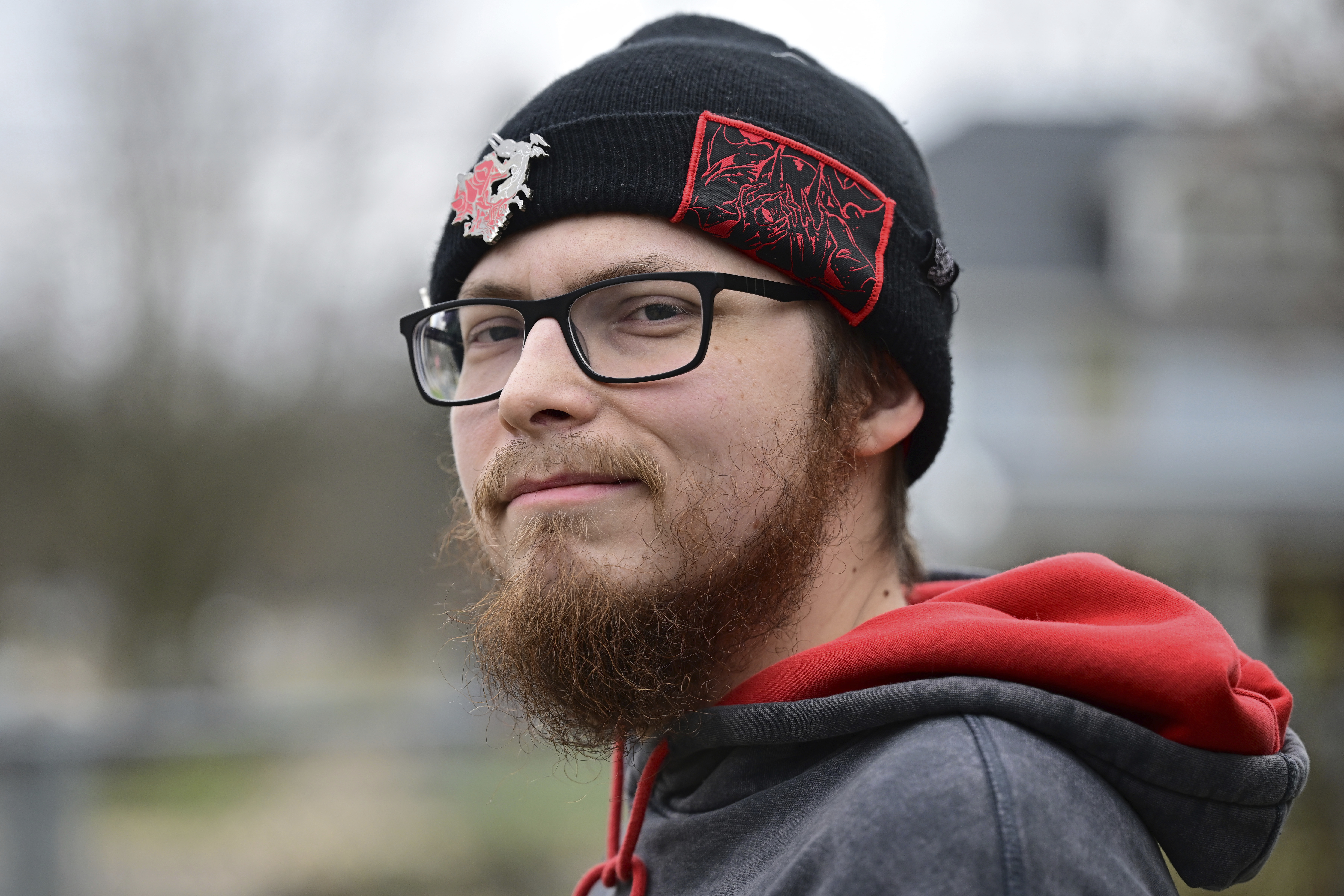 Nicholas Fontaine poses for a portrait outside his home in Akron, Ohio, Tuesday, Dec. 3, 2024. Fontaine is charged with one count of illegal voting. (AP Photo/David Dermer)