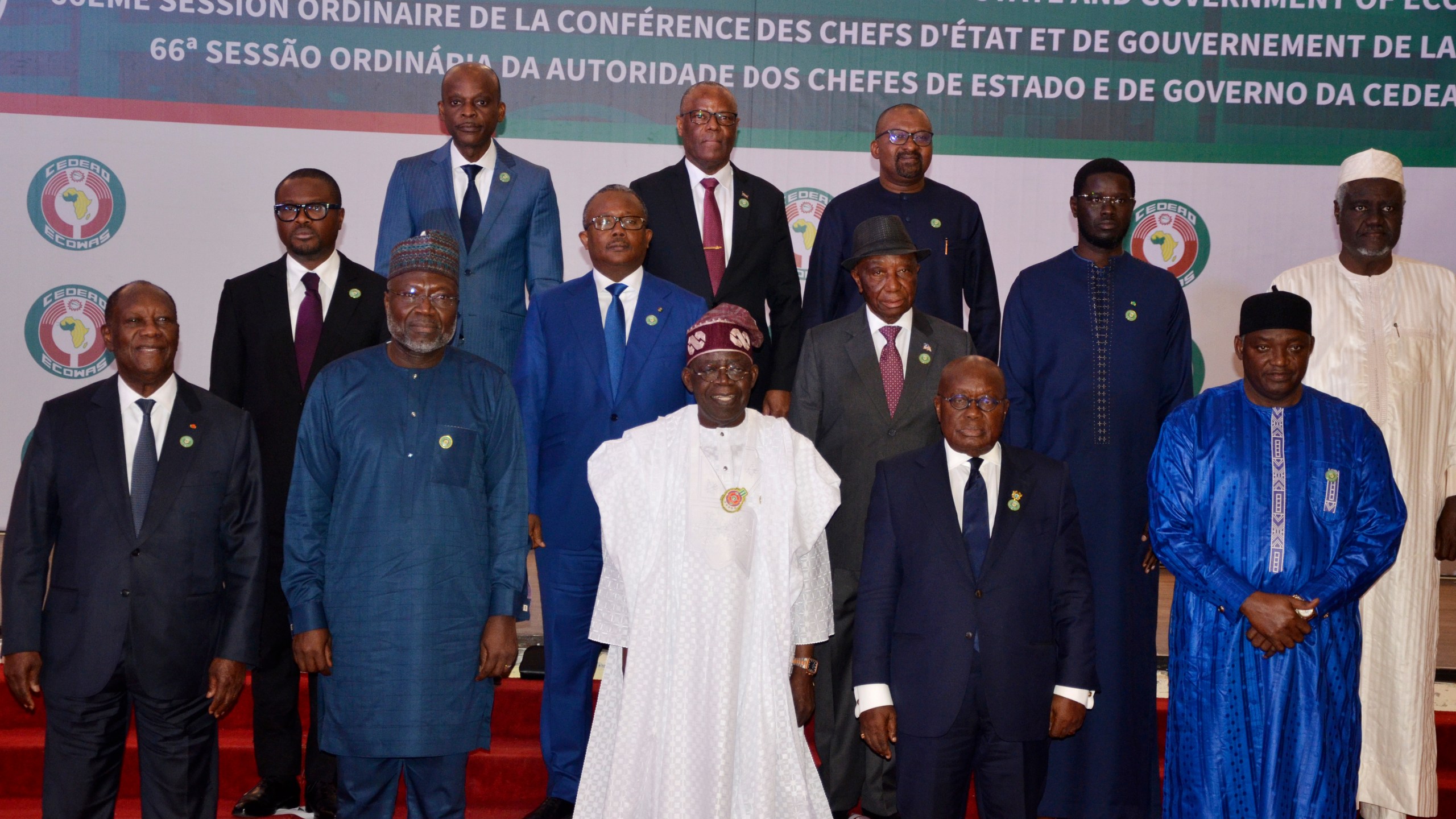 Nigeria's President, Bola Ahmed Tinubu, third from left, first row, poses for a group photo with other West African leaders, prior to the start of the ECOWAS meeting, in Abuja, Nigeria, Sunday, Dec. 15, 2024. (AP Photo/Olamikan Gbemiga)