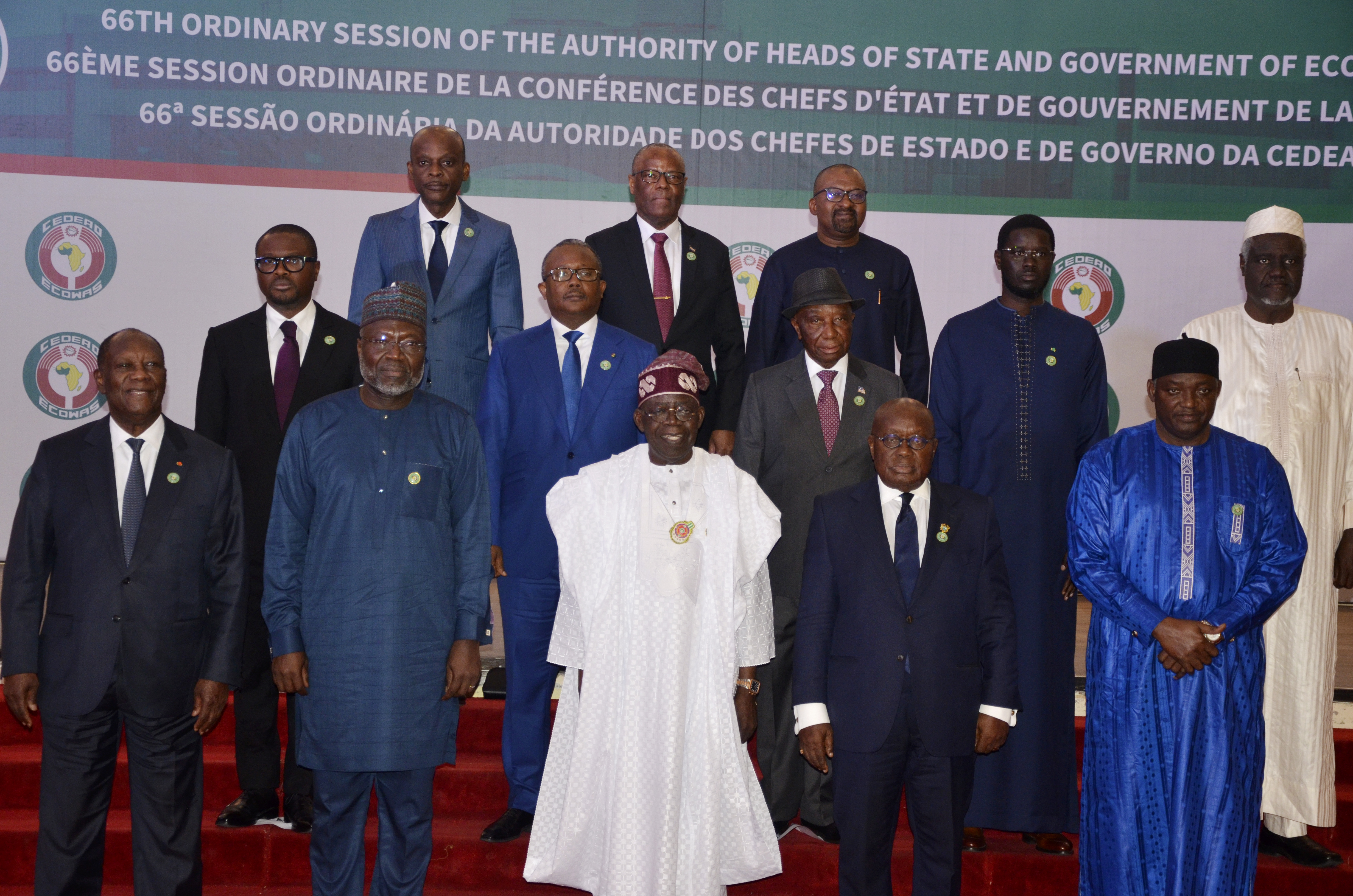 Nigeria's President, Bola Ahmed Tinubu, third from left, first row, poses for a group photo with other West African leaders, prior to the start of the ECOWAS meeting, in Abuja, Nigeria, Sunday, Dec. 15, 2024. (AP Photo/Olamikan Gbemiga)