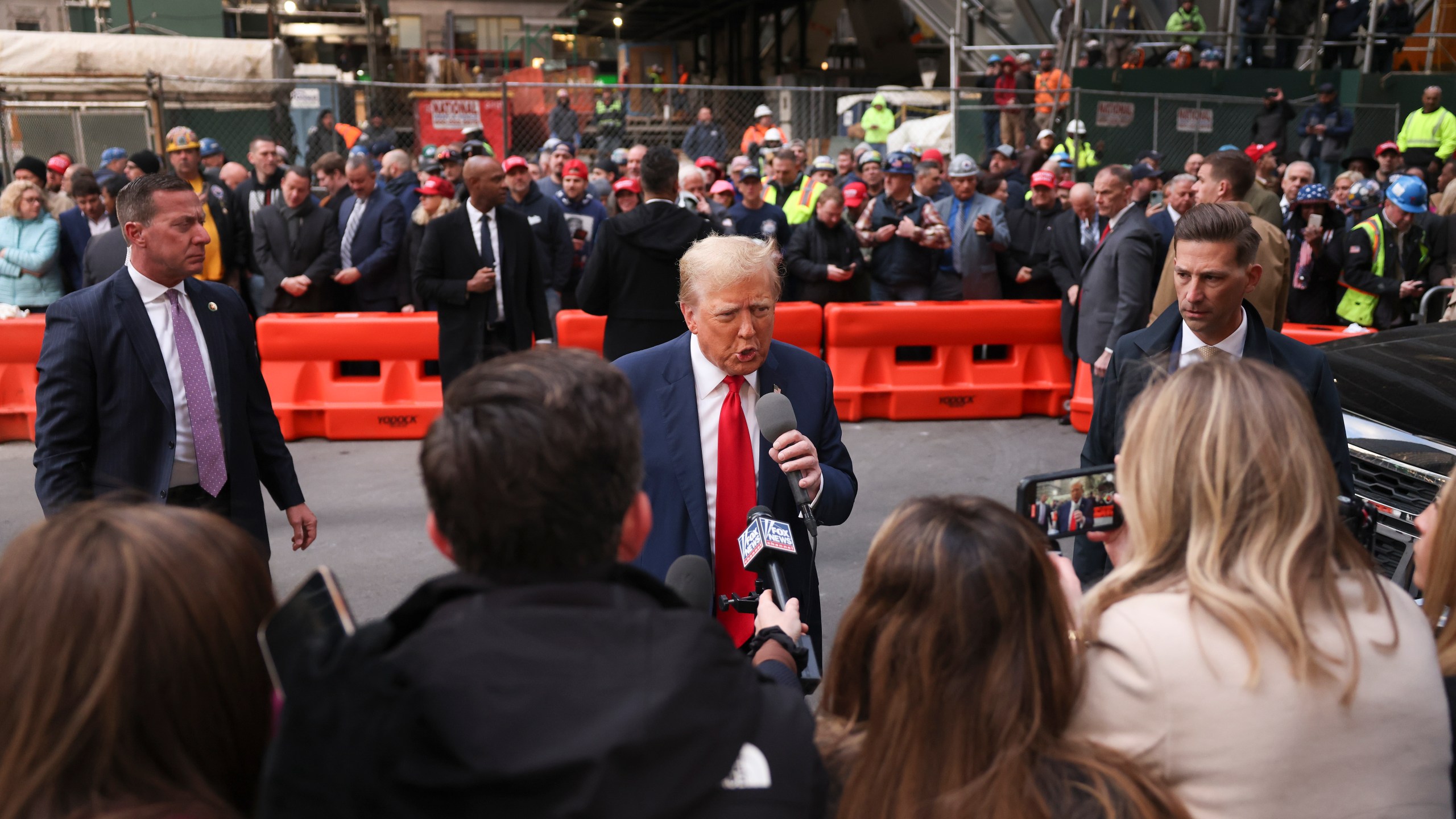 FILE - Former President Donald Trump speaks members of the media while visiting with construction workers at the construction site of the new JPMorgan Chase headquarters in midtown Manhattan, Thursday, April 25, 2024, in New York. Trump met with construction workers and union representatives hours before he's set to appear in court. (AP Photo/Yuki Iwamura, File)