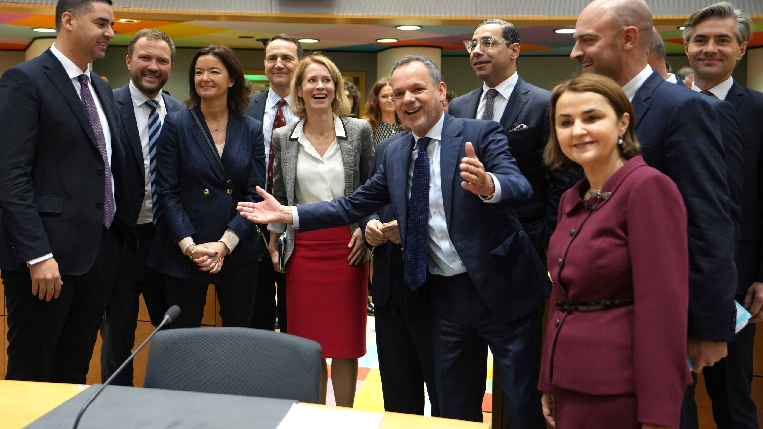 European Union foreign ministers pose with European Union foreign policy chief Kaja Kallas, center, as she chairs her first meeting of EU foreign ministers at the European Council building in Brussels, Monday, Dec 16, 2024. (AP Photo/Virginia Mayo)