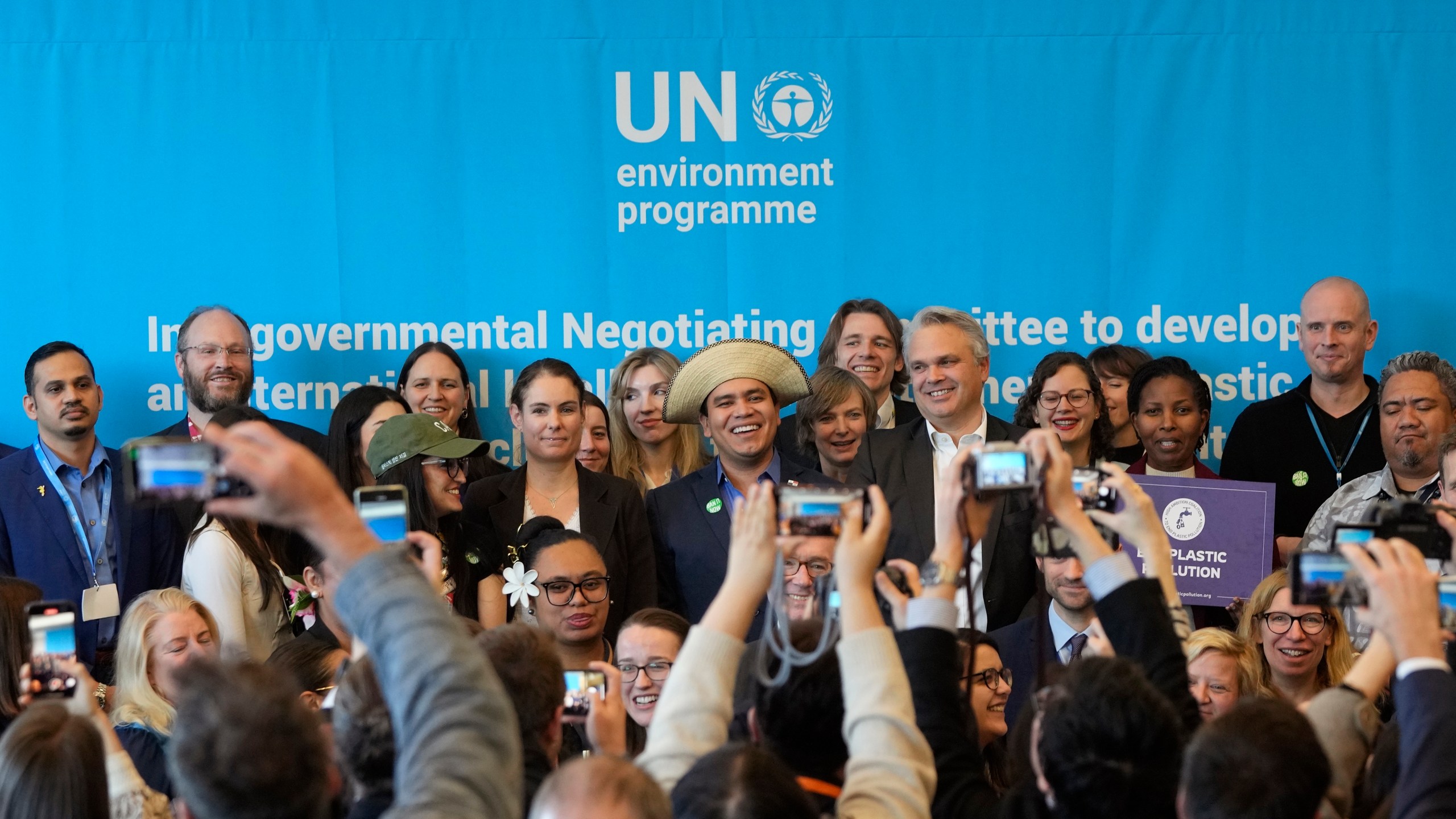 FILE - Juliet Kabera, third from right, director general of the Rwanda Environment Management Authority, Anthony Agotha, special envoy for Climate and Environment Diplomacy, European Union, Panama's Juan Carlos Monterrey, Olga Givernet, French Delegate Minister for Energy and Mexico's Camila Zepeda pose after a news conference at the fifth session of the Intergovernmental Negotiating Committee on Plastic Pollution in Busan, South Korea, Dec. 1, 2024. (AP Photo/Ahn Young-joon)