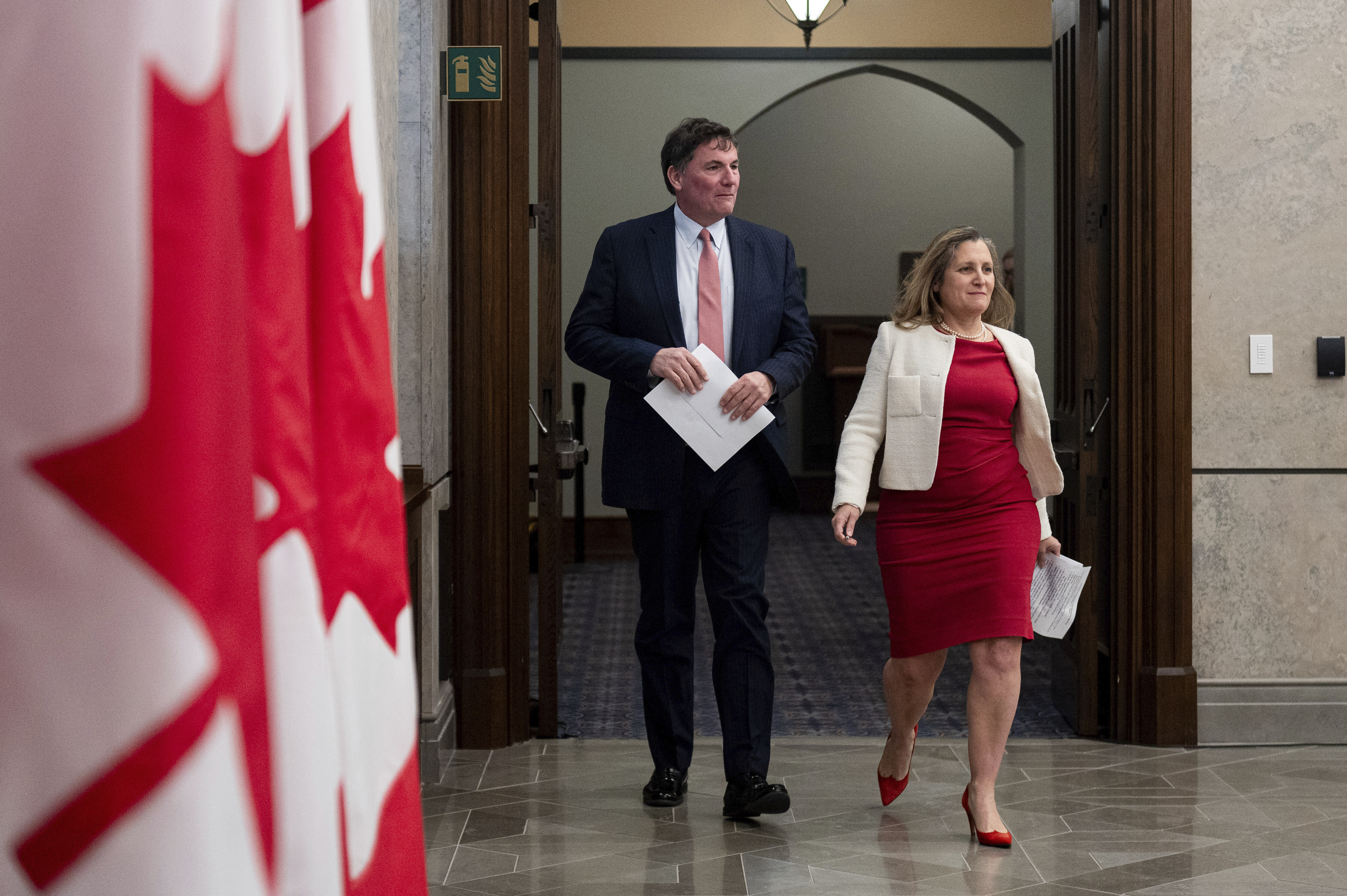 Minister of Finance and Deputy Prime Minister Chrystia Freeland, right, and Minister of Public Safety, Democratic Institutions and Intergovernmental Affairs Dominic LeBlanc arrive for a press conference on Parliament Hill in Ottawa, Ontario, Wednesday, Dec. 11, 2024. (Spencer Colby/The Canadian Press via AP)