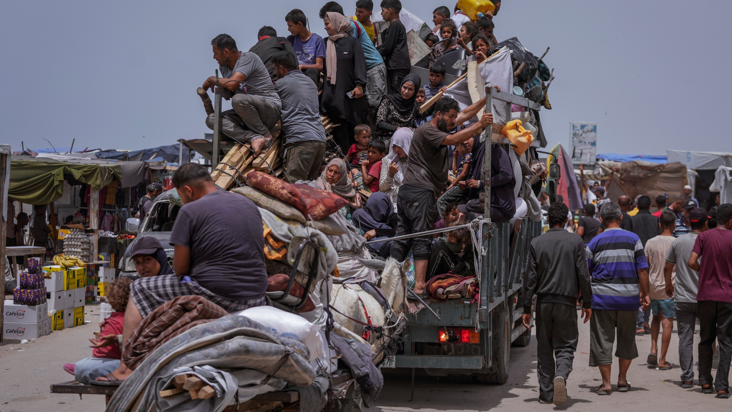 FILE - Palestinians flee from the southern Gaza city of Rafah during an Israeli ground and air offensive May 28, 2024. (AP Photo/Abdel Kareem Hana, File)