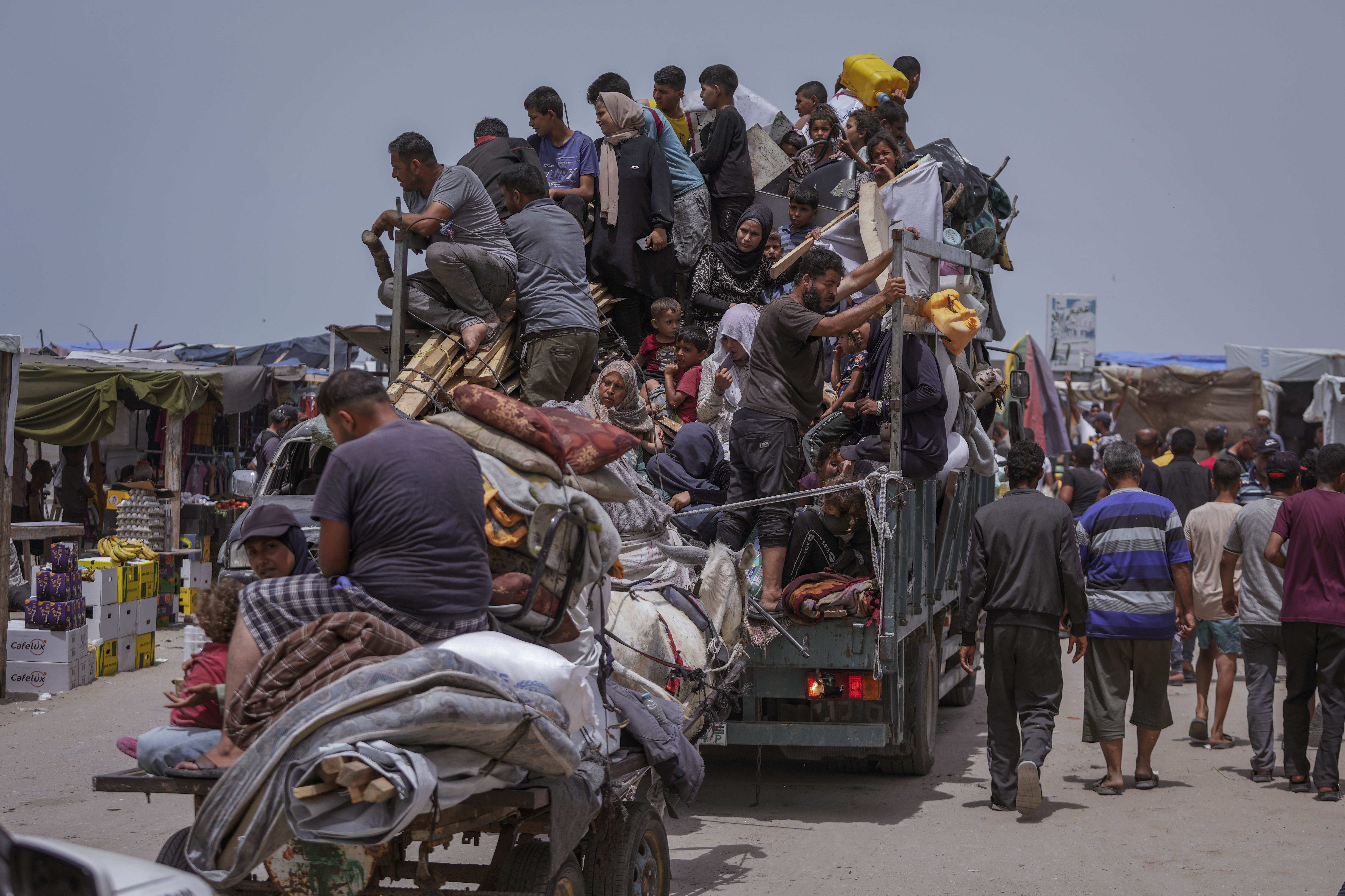 FILE - Palestinians flee from the southern Gaza city of Rafah during an Israeli ground and air offensive May 28, 2024. (AP Photo/Abdel Kareem Hana, File)