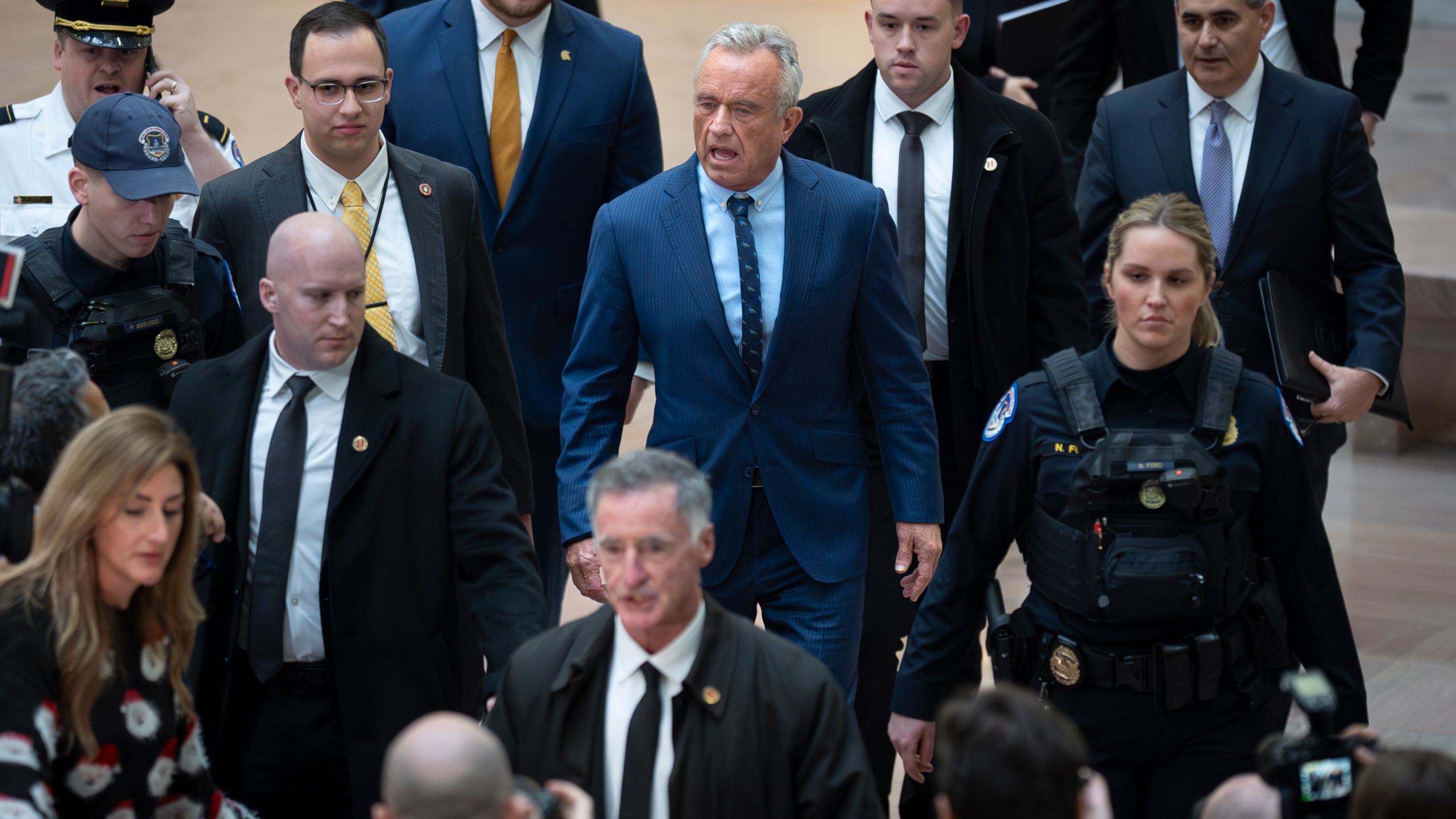 Robert F. Kennedy Jr., President-elect Donald Trump's nominee to be Secretary of Health and Human Services, arrives at the Hart Building to meet with Senators at the Capitol in Washington, Monday, Dec. 16, 2024. (AP Photo/J. Scott Applewhite)