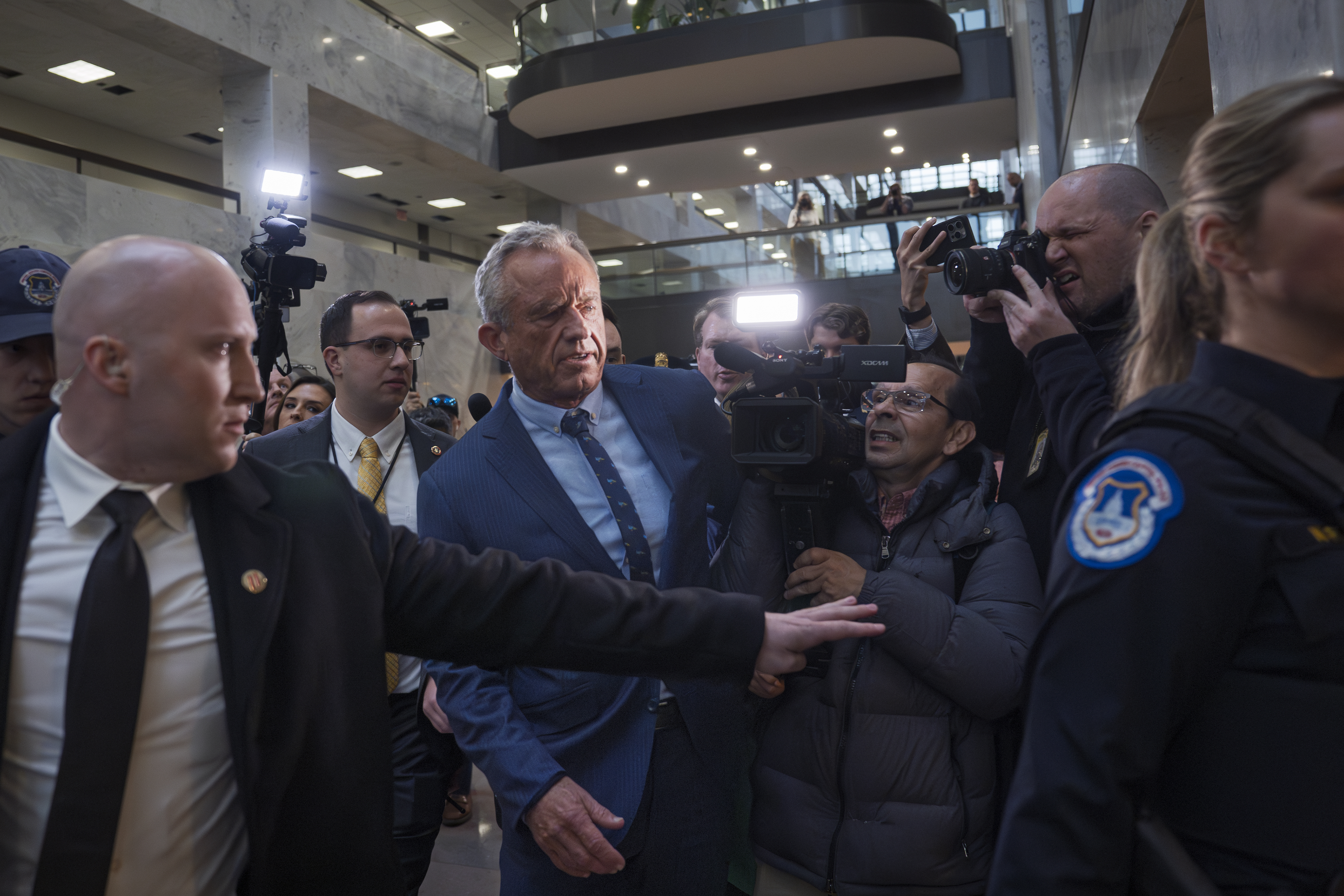 Robert F. Kennedy Jr., President-elect Donald Trump's nominee to be Secretary of Health and Human Services, arrives at the Hart Building to meet with senators at the Capitol in Washington, Monday, Dec. 16, 2024. (AP Photo/J. Scott Applewhite)