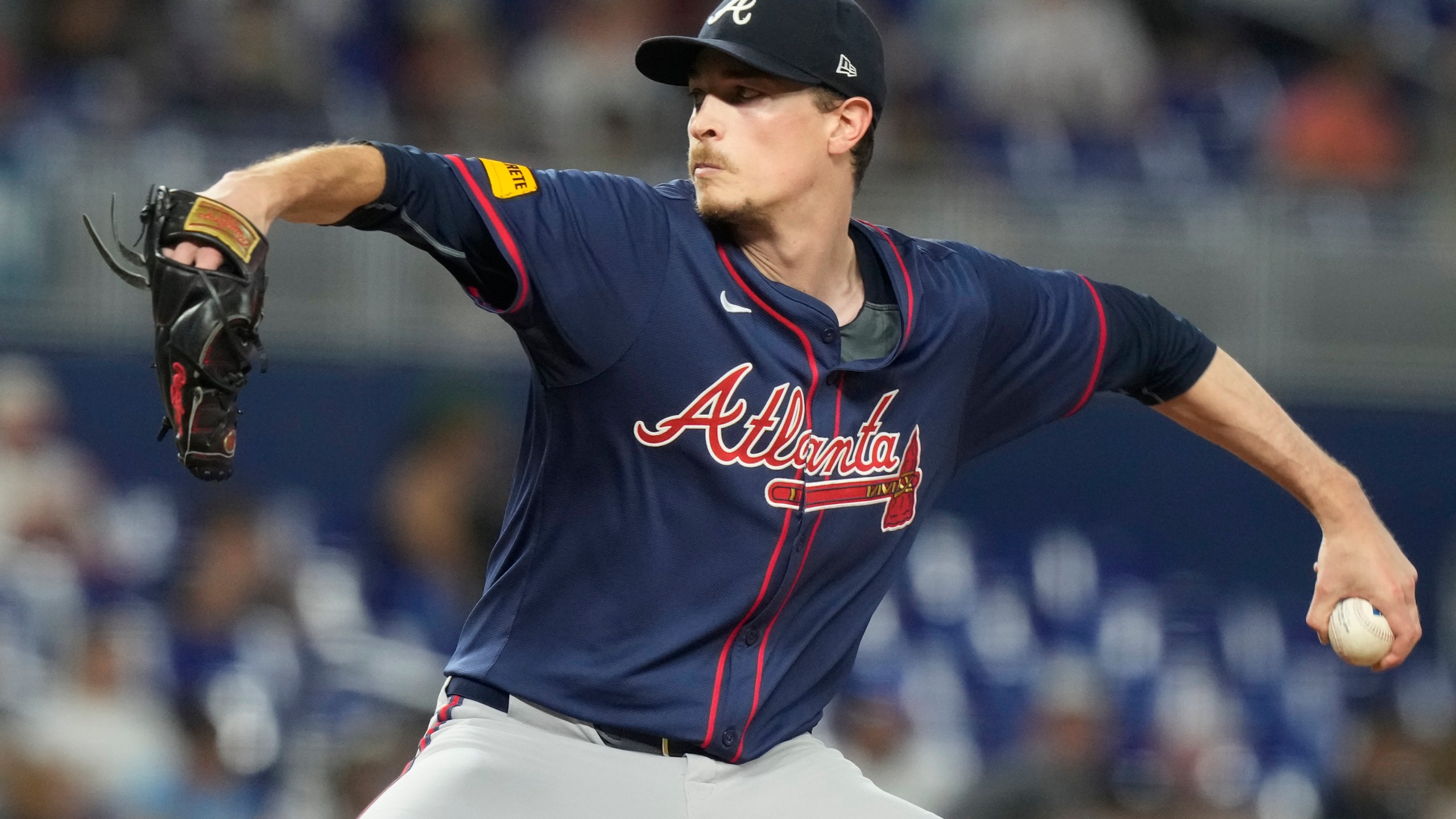 FILE - Atlanta Braves starting pitcher Max Fried aims a pitch during the third inning of a baseball game against the Miami Marlins, Saturday, Sept. 21, 2024, in Miami. (AP Photo/Marta Lavandier, File)