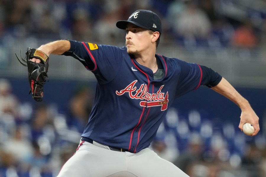 FILE - Atlanta Braves starting pitcher Max Fried aims a pitch during the third inning of a baseball game against the Miami Marlins, Saturday, Sept. 21, 2024, in Miami. (AP Photo/Marta Lavandier, File)