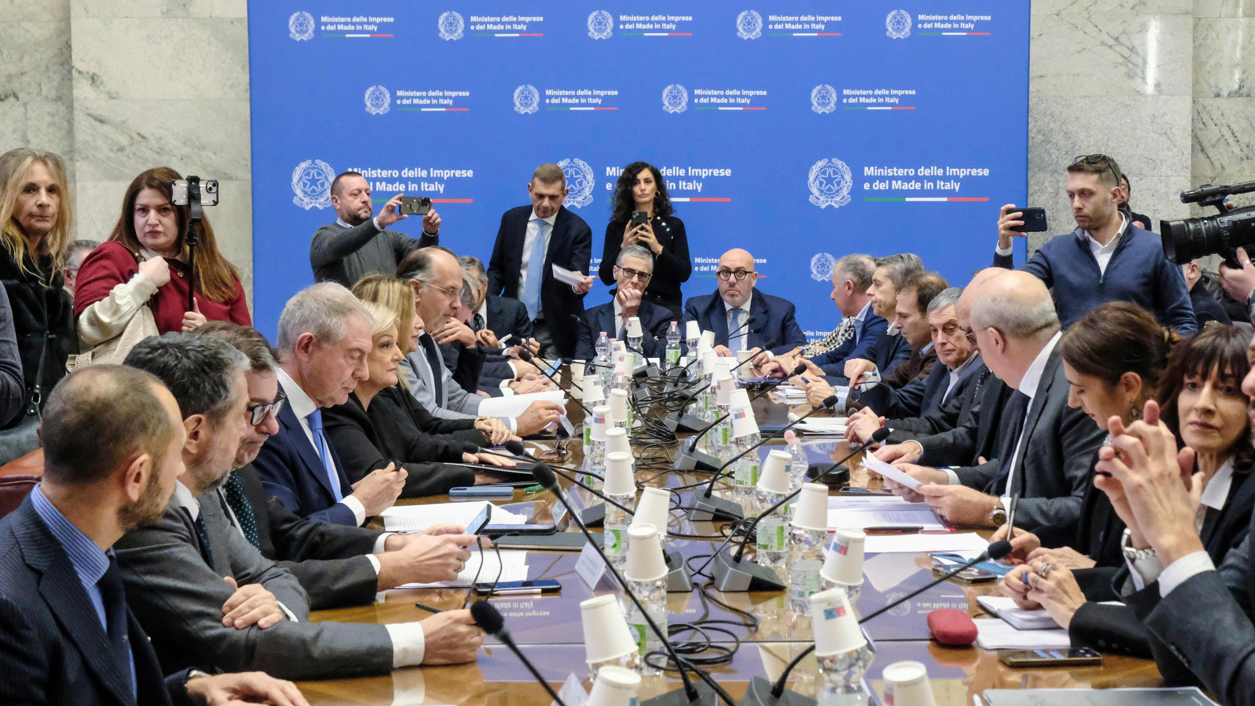 Executives from Stellantis and economic, labor and economic development ministers sit during a meeting held at the Ministry of Enterprise and Made in Italy in Rome, Tuesday, Dec. 17, 2024. (Mauro Scrobogna/LaPresse via AP)