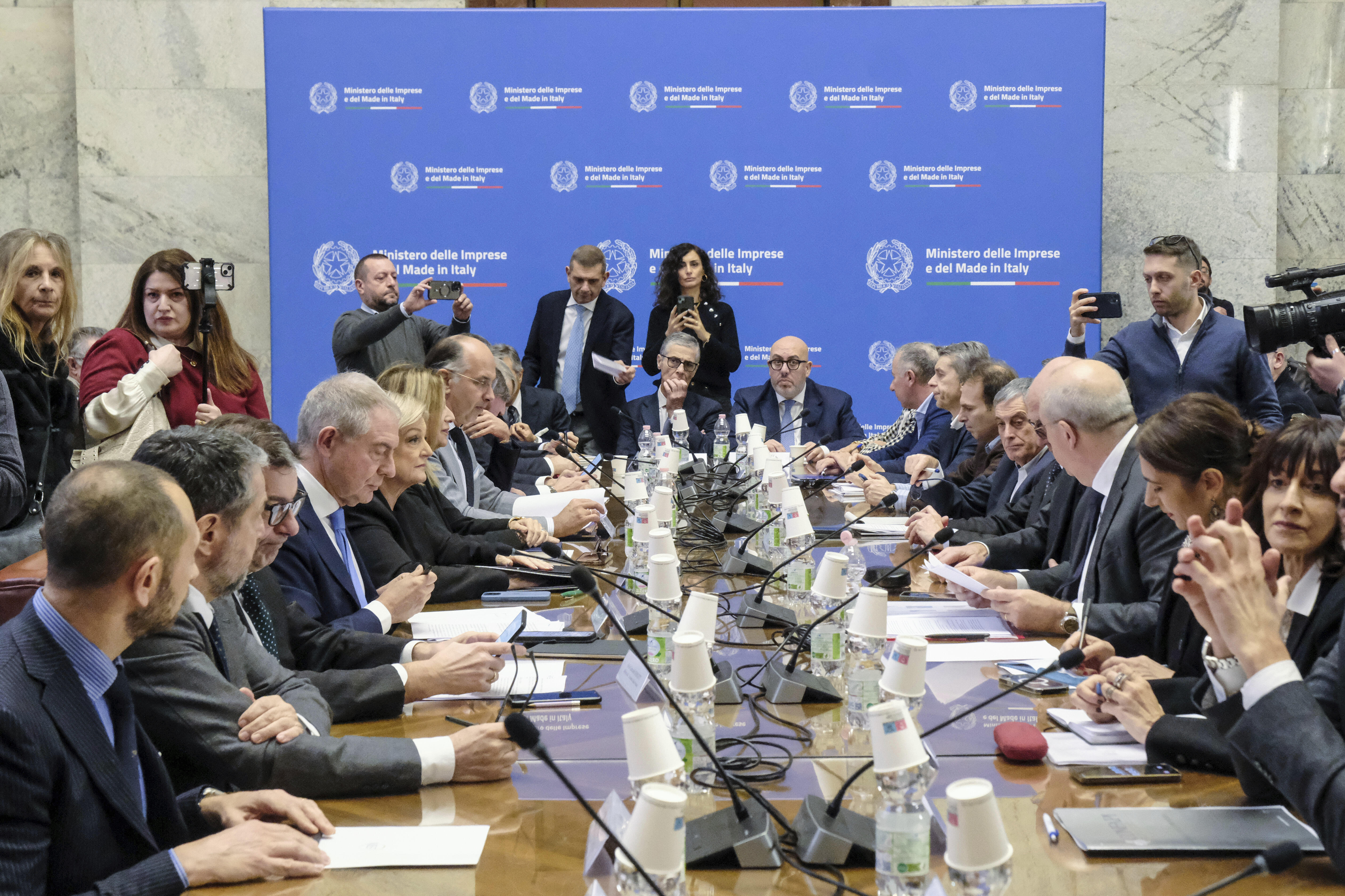 Executives from Stellantis and economic, labor and economic development ministers sit during a meeting held at the Ministry of Enterprise and Made in Italy in Rome, Tuesday, Dec. 17, 2024. (Mauro Scrobogna/LaPresse via AP)