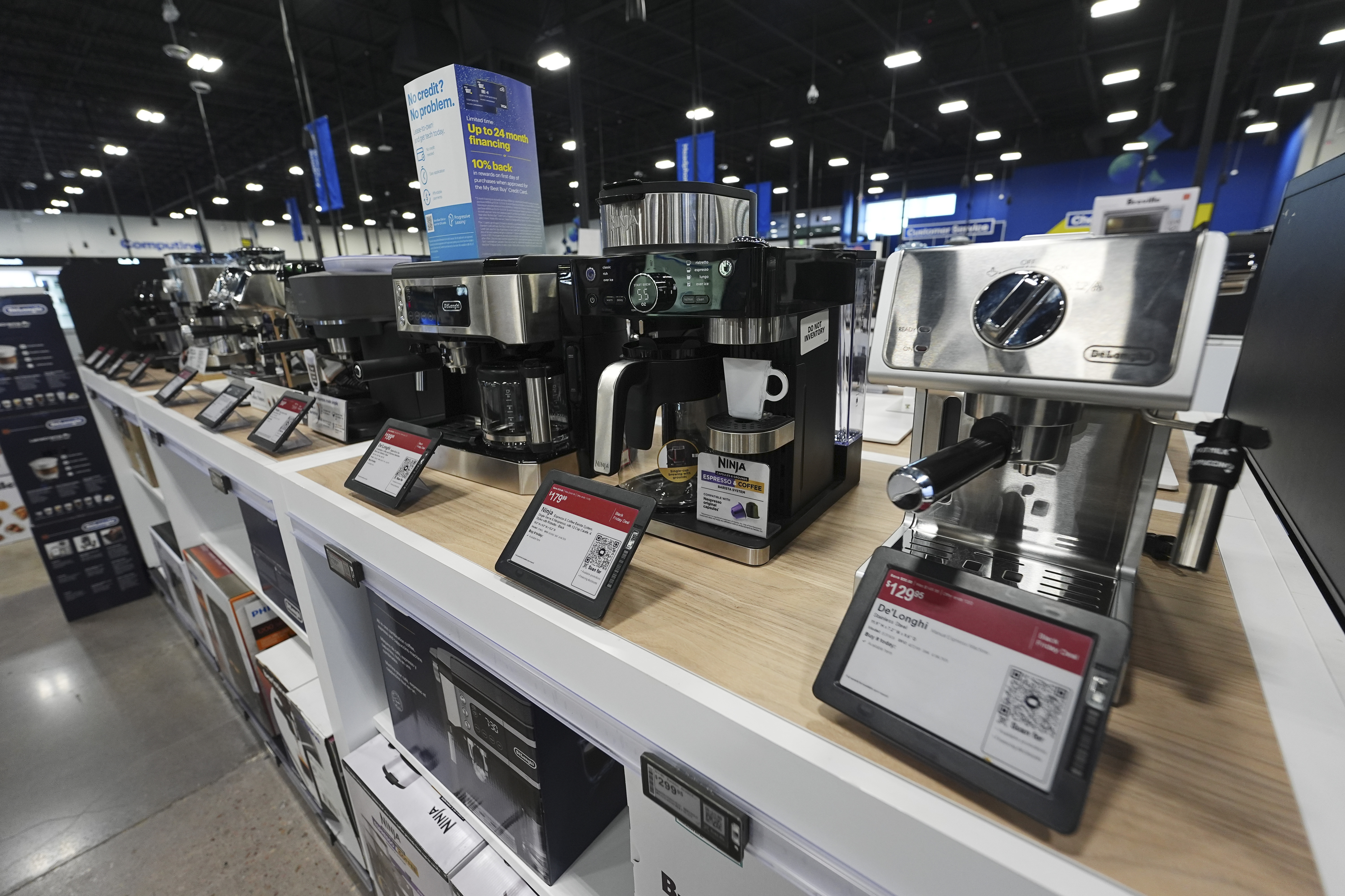 FILE - Coffee makers sit on display in a Best Buy store Nov. 21, 2024, in south Denver. (AP Photo/David Zalubowski, File)