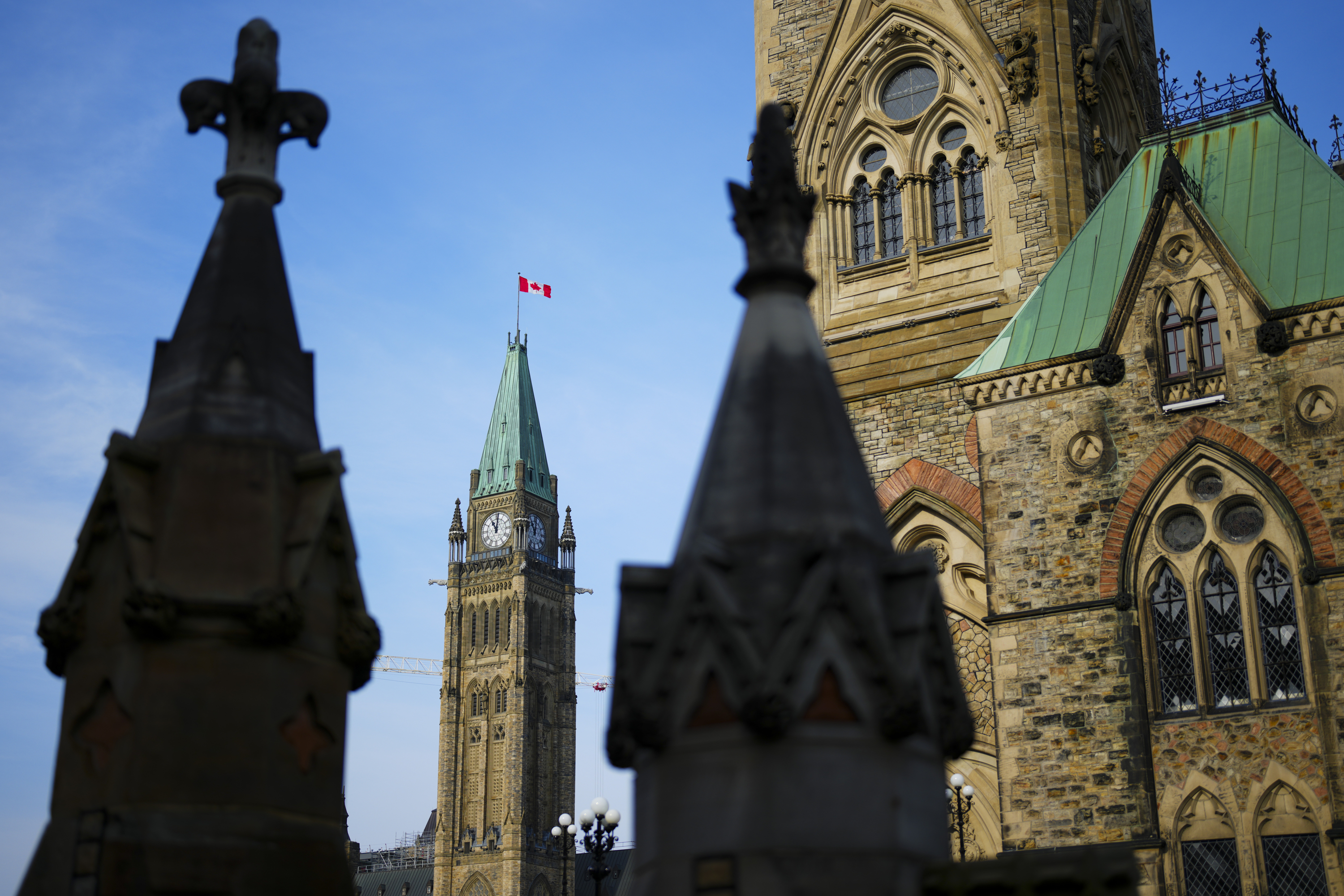 FILE - The Canada Flag flies atop the Peace Tower on Parliament Hill in Ottawa on Oct. 30, 2024. (Sean Kilpatrick/The Canadian Press via AP, File)