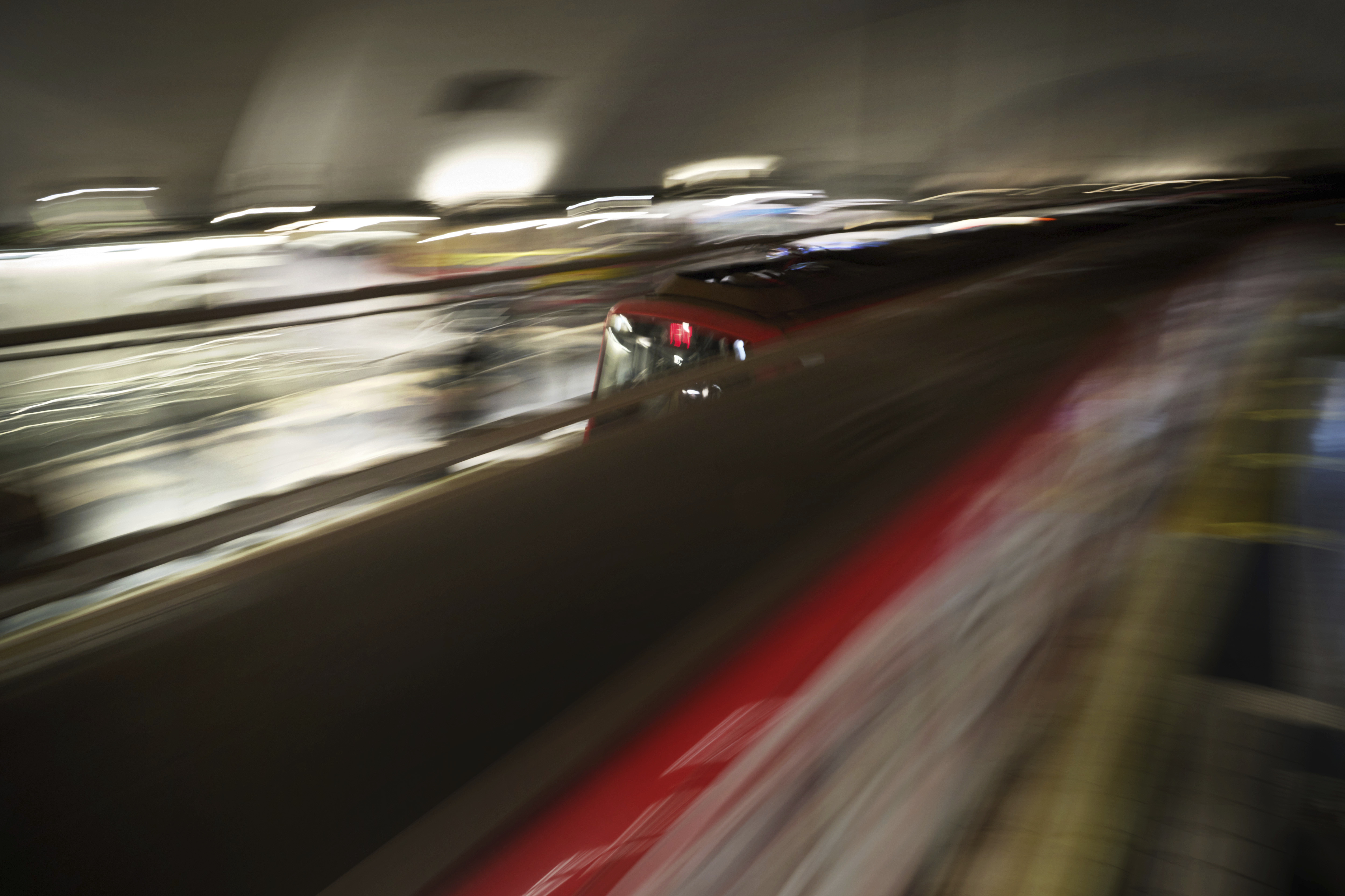 Metro trains come and go picking up and dropping off passengers at a Barcelona metro station Spain, Monday, Dec. 2, 2024. (AP Photo/Emilio Morenatti)