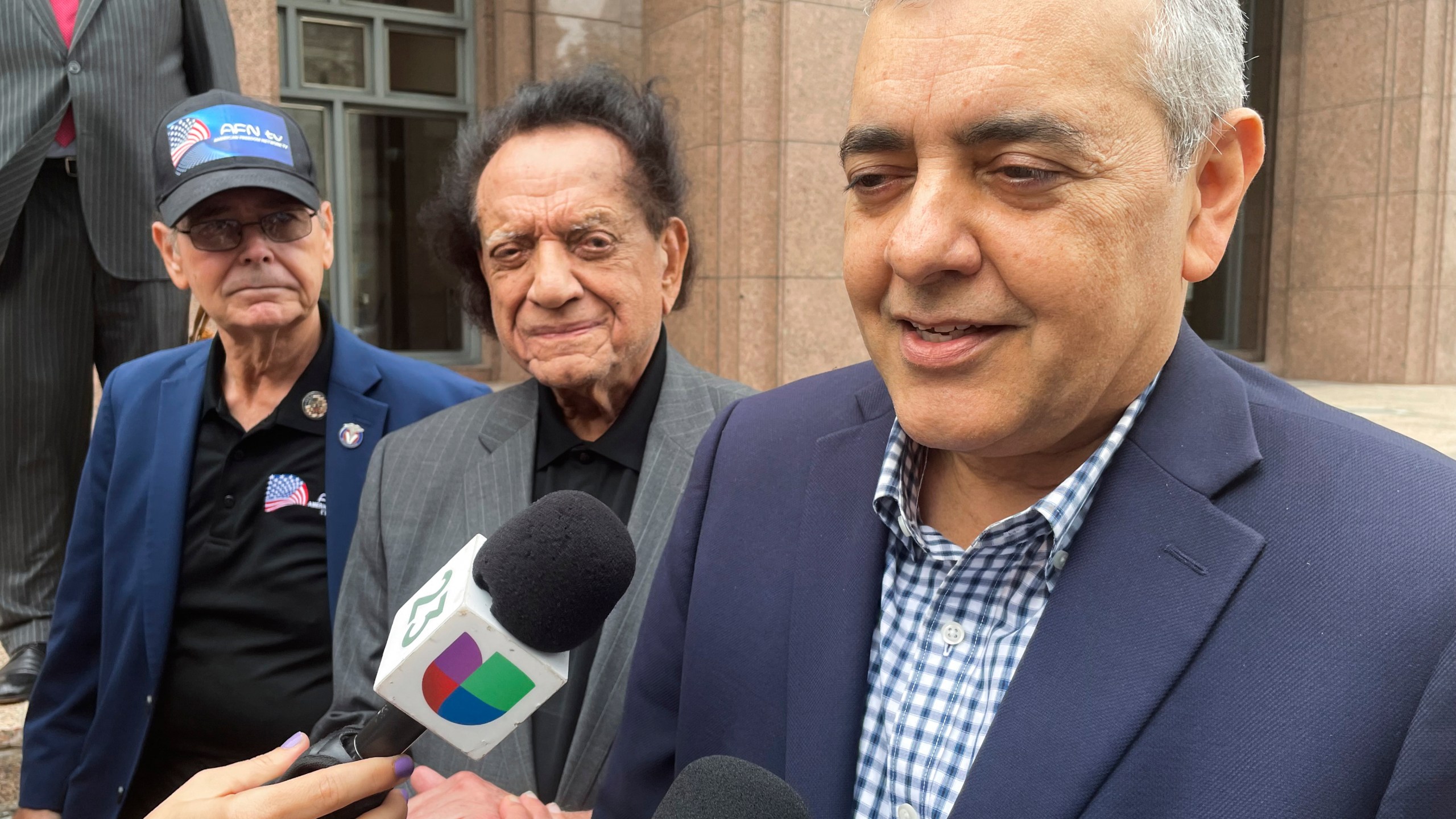 FILE - Former U.S. Rep. David Rivera speaks with media outside Miami federal court, in Miami, Dec. 20, 2022. (AP Photo/Joshua Goodman, File)