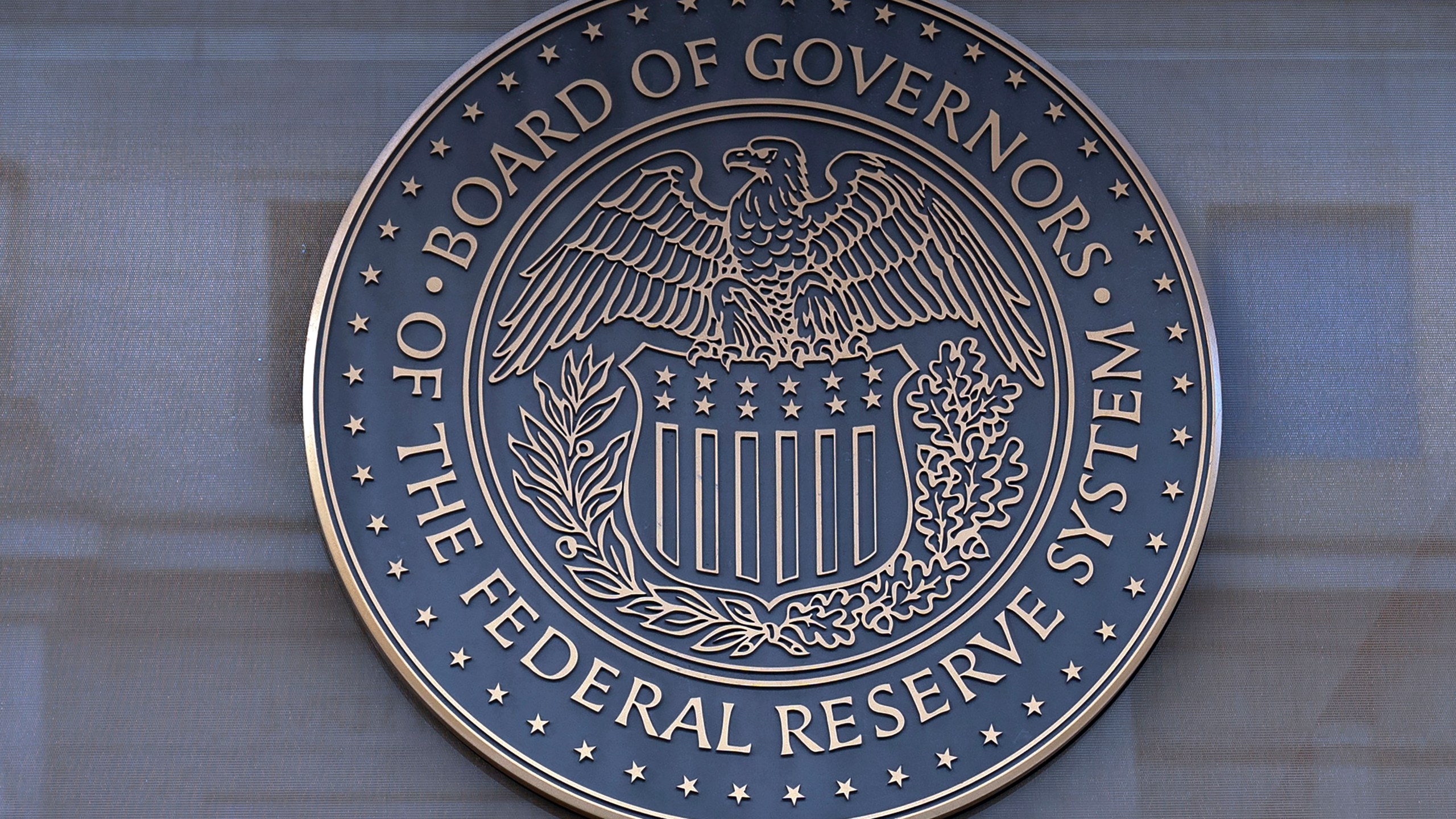 FILE - The seal of the Federal Reserve Board is seen at the building in Washington, Dec. 8, 2024. (AP Photo/Jose Luis Magana, File)