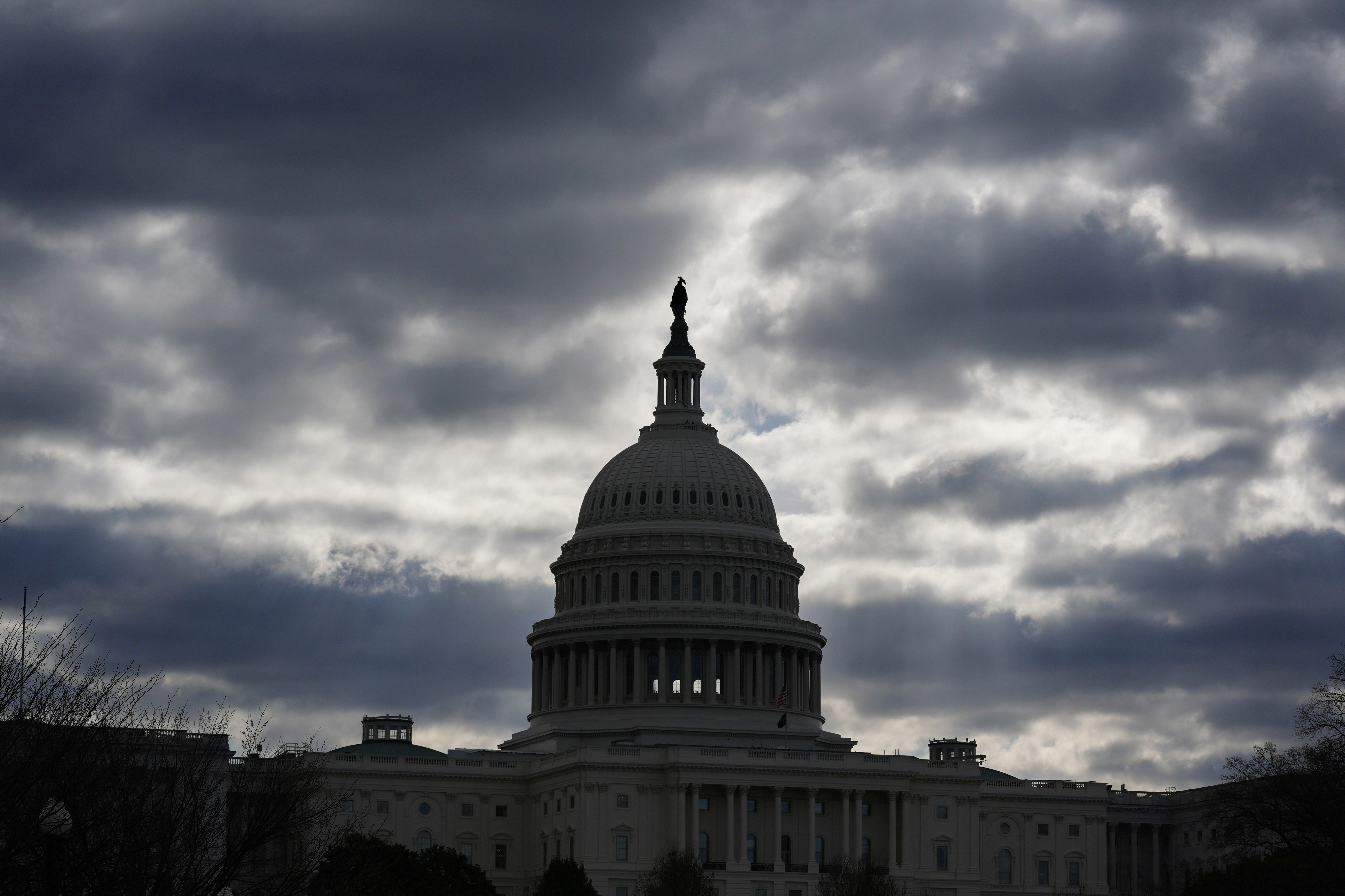 FILE - The Capitol in Washington, is framed by early morning clouds, March 19, 2024. Congress has until midnight Friday to come up with a way to fund the government, or federal agencies will shutter. It's up to each federal agency to determine how it handles a shutdown, but there would be disruptions in many services. (AP Photo/J. Scott Applewhite, File)