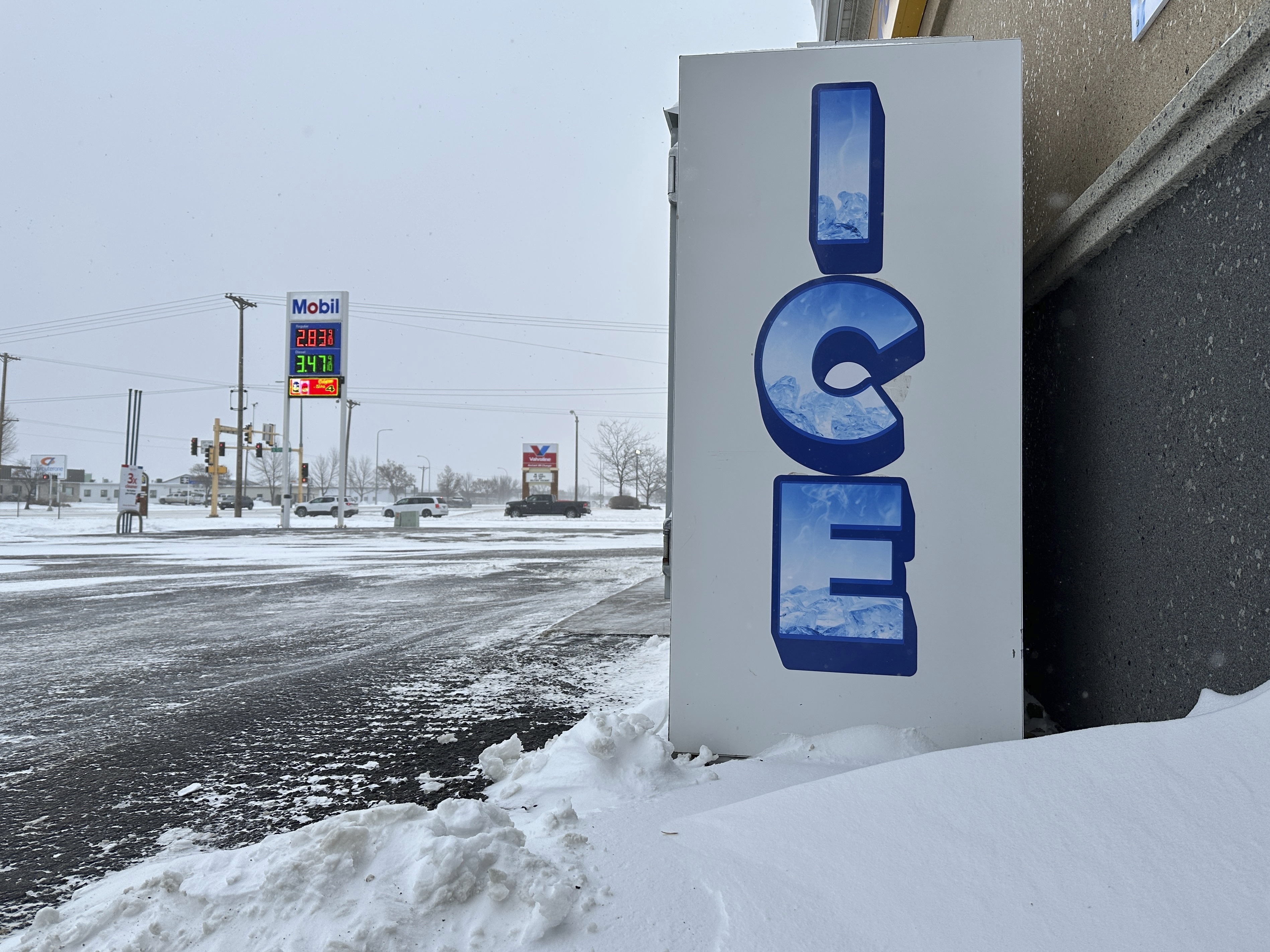 A convenience store's ice storage is a sign of the times on a blustery winter day in Bismarck, N.D., on Thursday, Dec. 19, 2024. (AP Photo/Jack Dura)