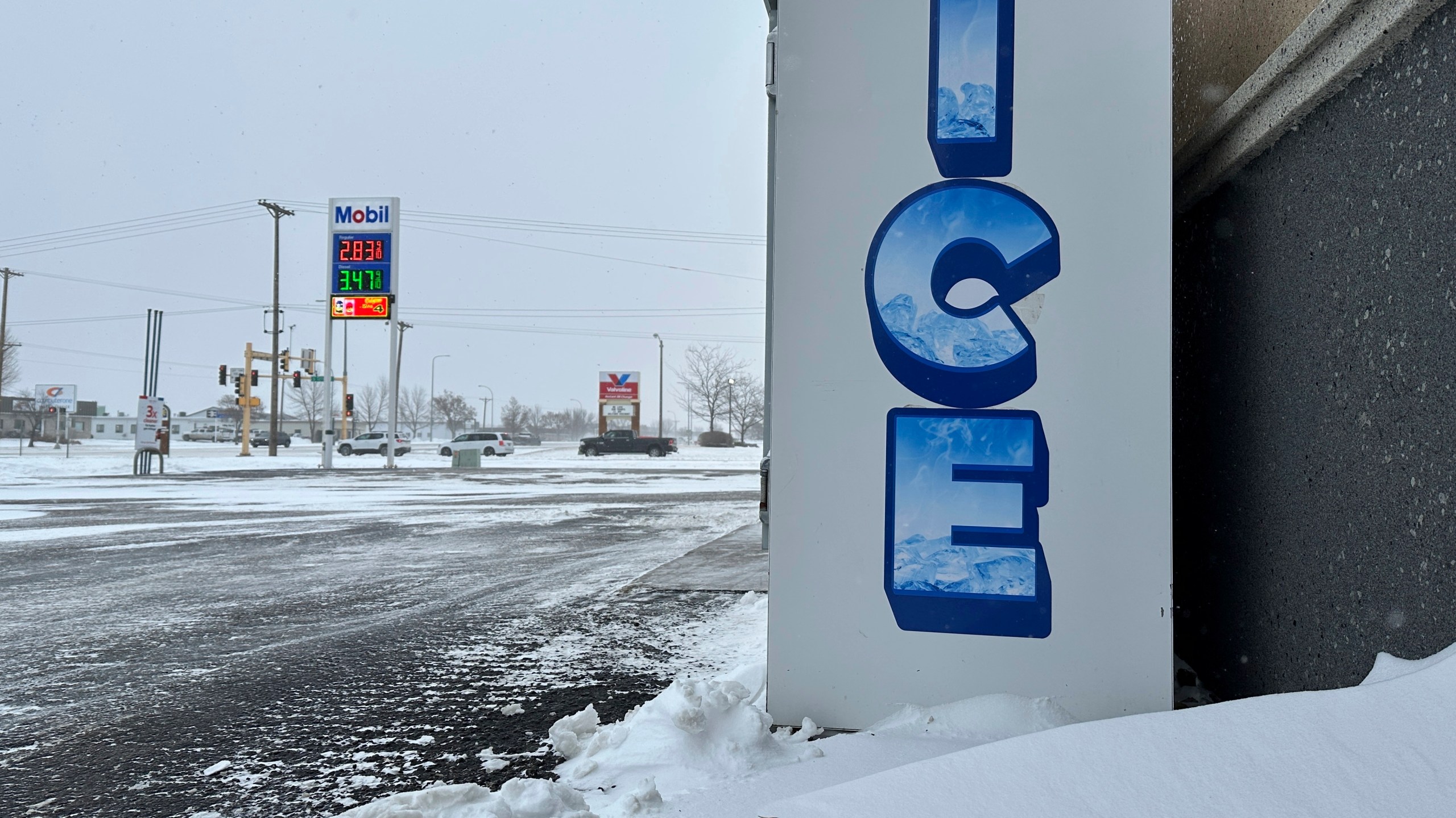 A convenience store's ice storage is a sign of the times on a blustery winter day in Bismarck, N.D., on Thursday, Dec. 19, 2024. (AP Photo/Jack Dura)