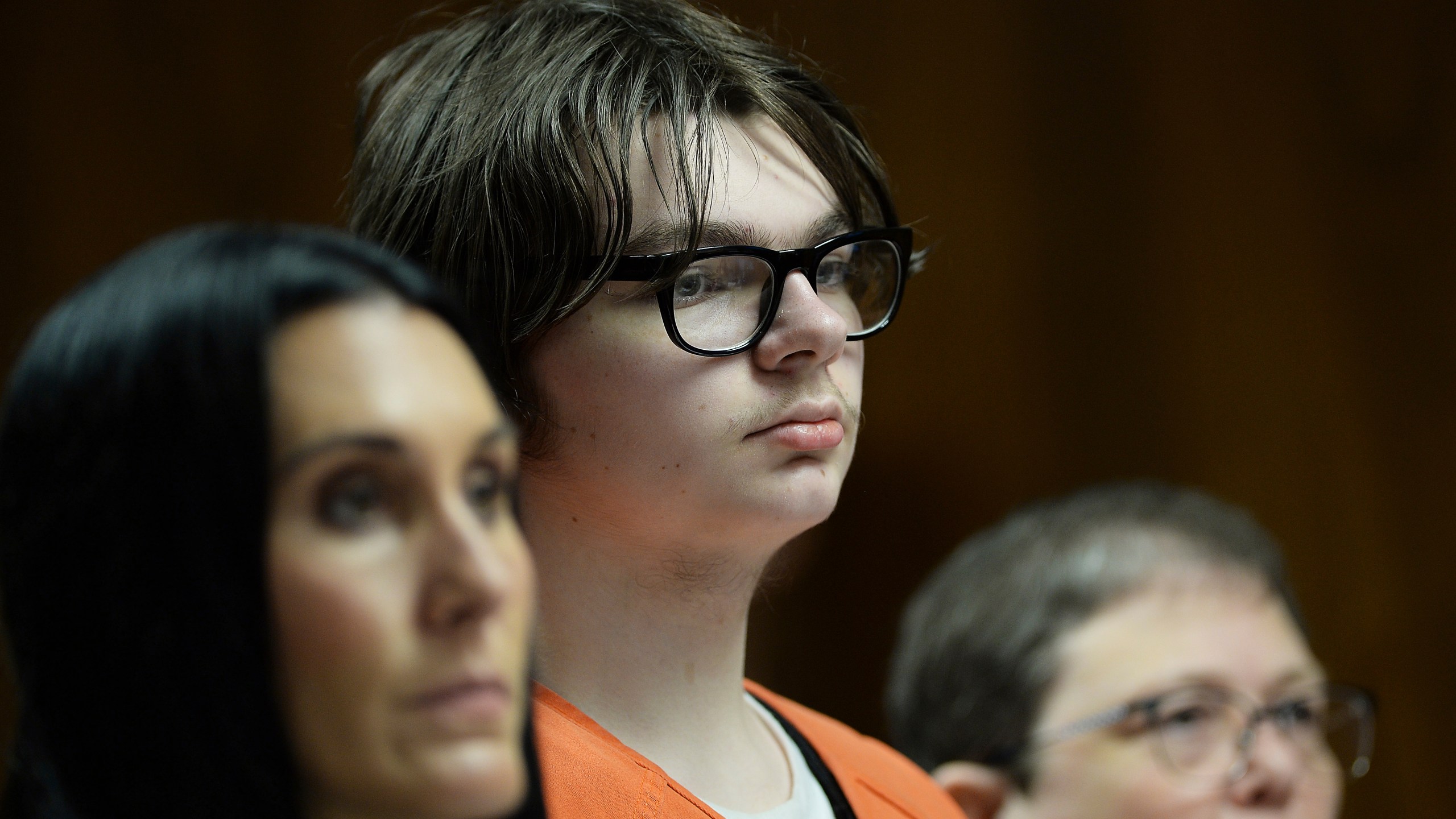 FILE - Ethan Crumbley stands with his attorneys, Paulette Loftin and Amy Hopp, during his hearing at Oakland County Circuit Court, Aug. 1, 2023, in Pontiac, Mich. (Clarence Tabb Jr./Detroit News via AP, Pool)