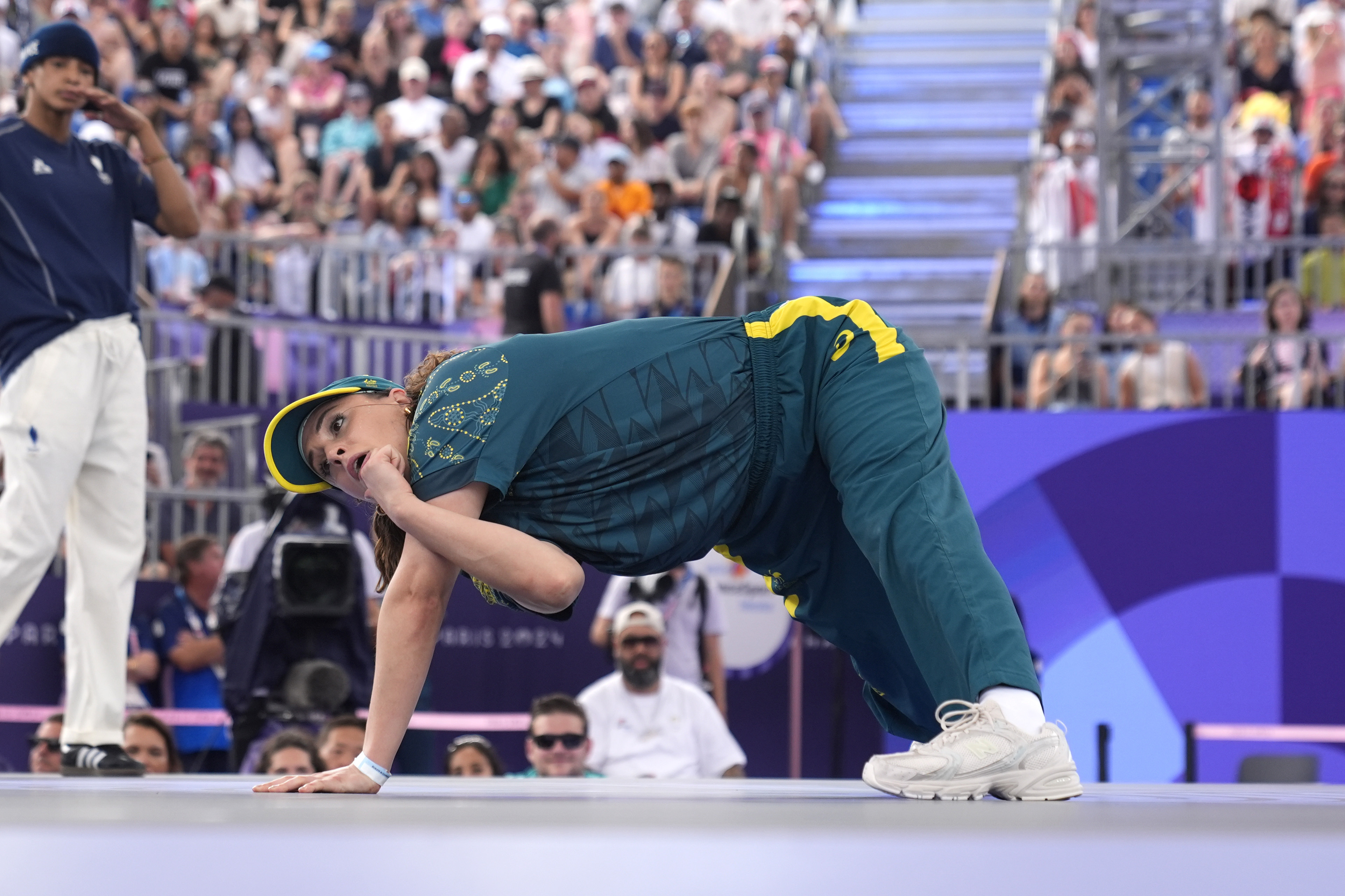 FILE - Australia's Rachael Gunn, known as B-Girl Raygun, competes during the Round Robin Battle at the breaking competition at La Concorde Urban Park at the 2024 Summer Olympics, Friday, Aug. 9, 2024, in Paris, France. (AP Photo/Frank Franklin, File)