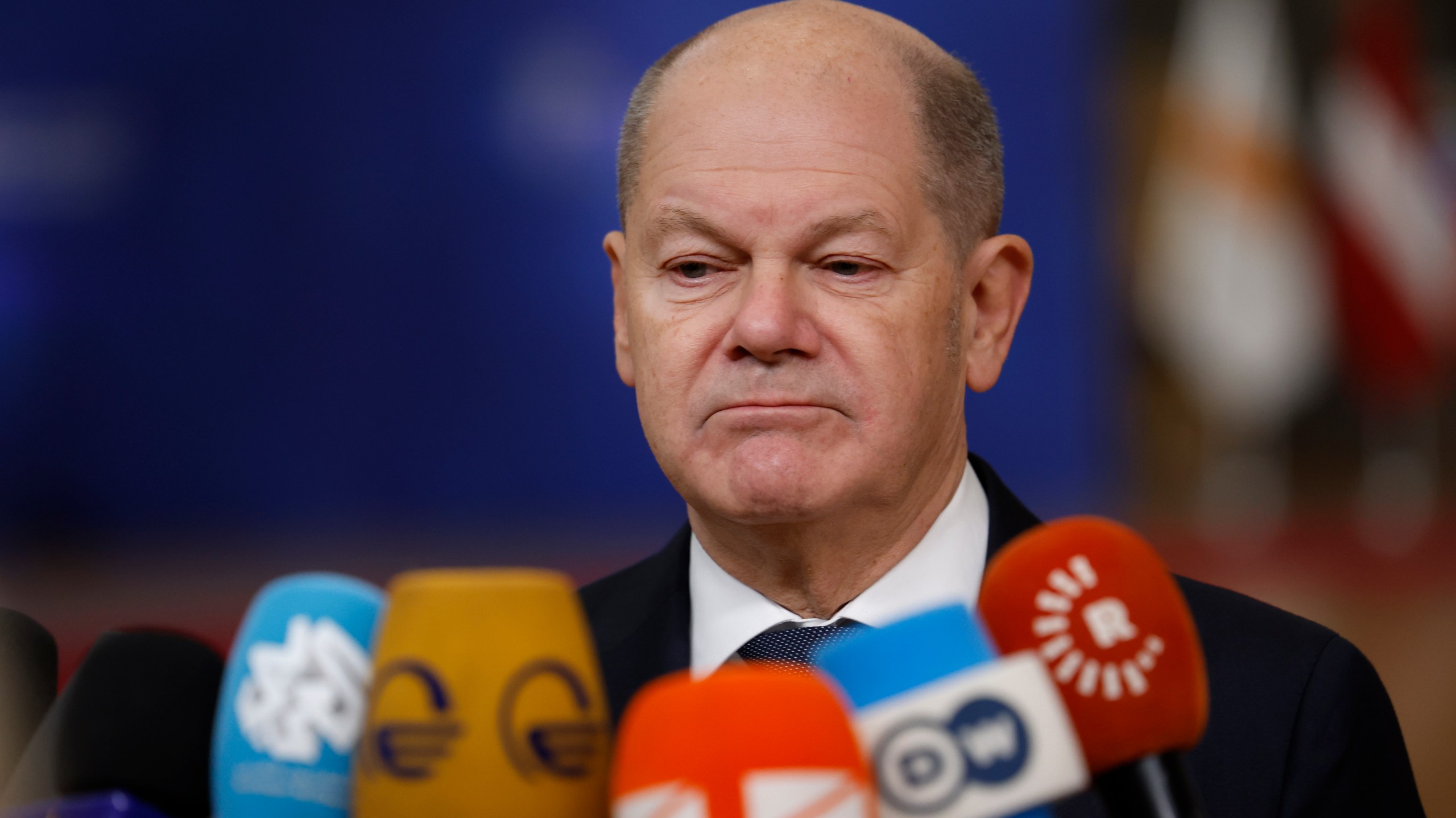 Germany's Chancellor Olaf Scholz speaks with the media as he arrives for an EU summit at the European Council building in Brussels, Thursday, Dec. 19, 2024. (AP Photo/Geert Vanden Wijngaert)