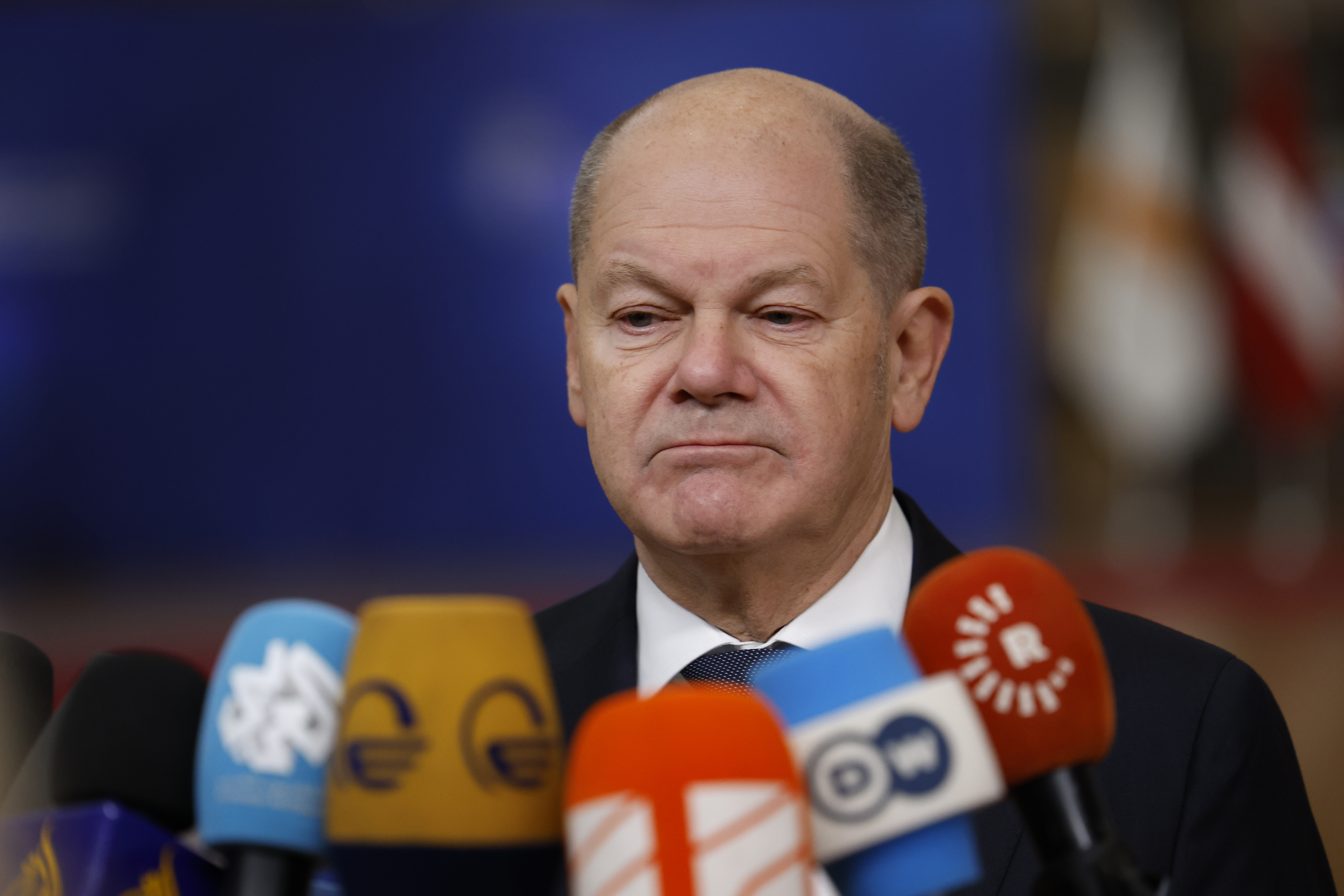 Germany's Chancellor Olaf Scholz speaks with the media as he arrives for an EU summit at the European Council building in Brussels, Thursday, Dec. 19, 2024. (AP Photo/Geert Vanden Wijngaert)