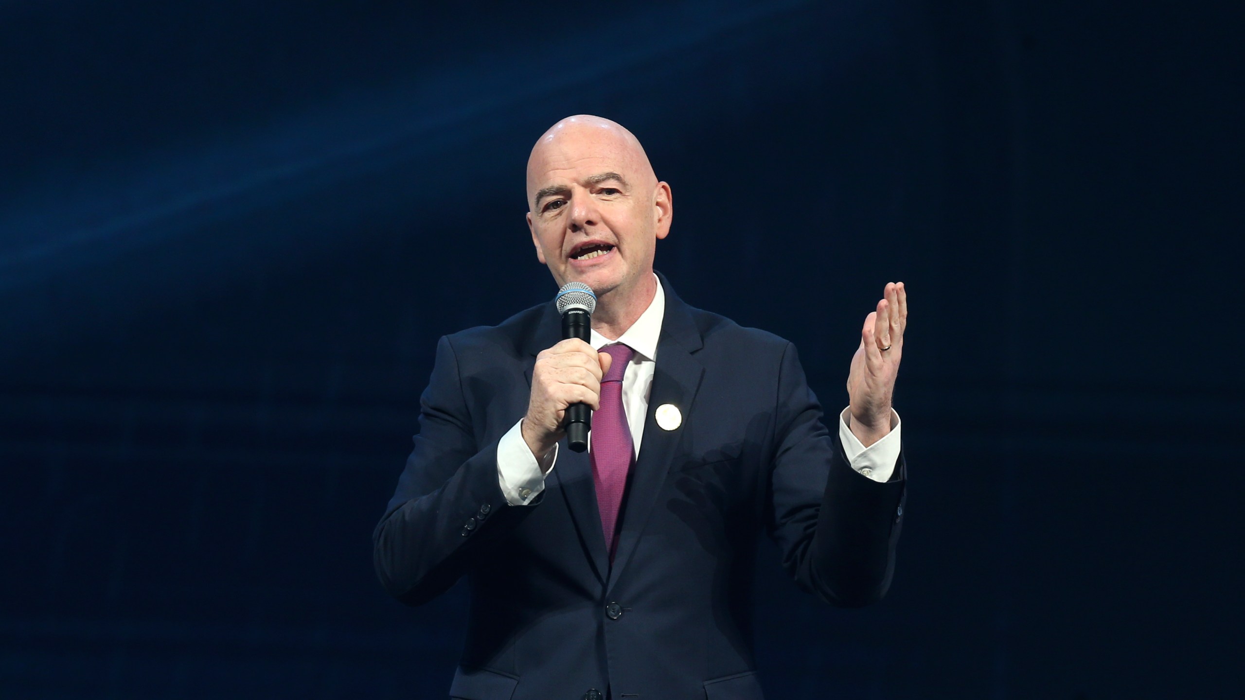 FIFA president Gianni Infantino delivers his speech before the FIFA Football Awards 2024 in Doha, Qatar, Tuesday, Dec. 17, 2024. (AP Photo/Hussein Sayed)