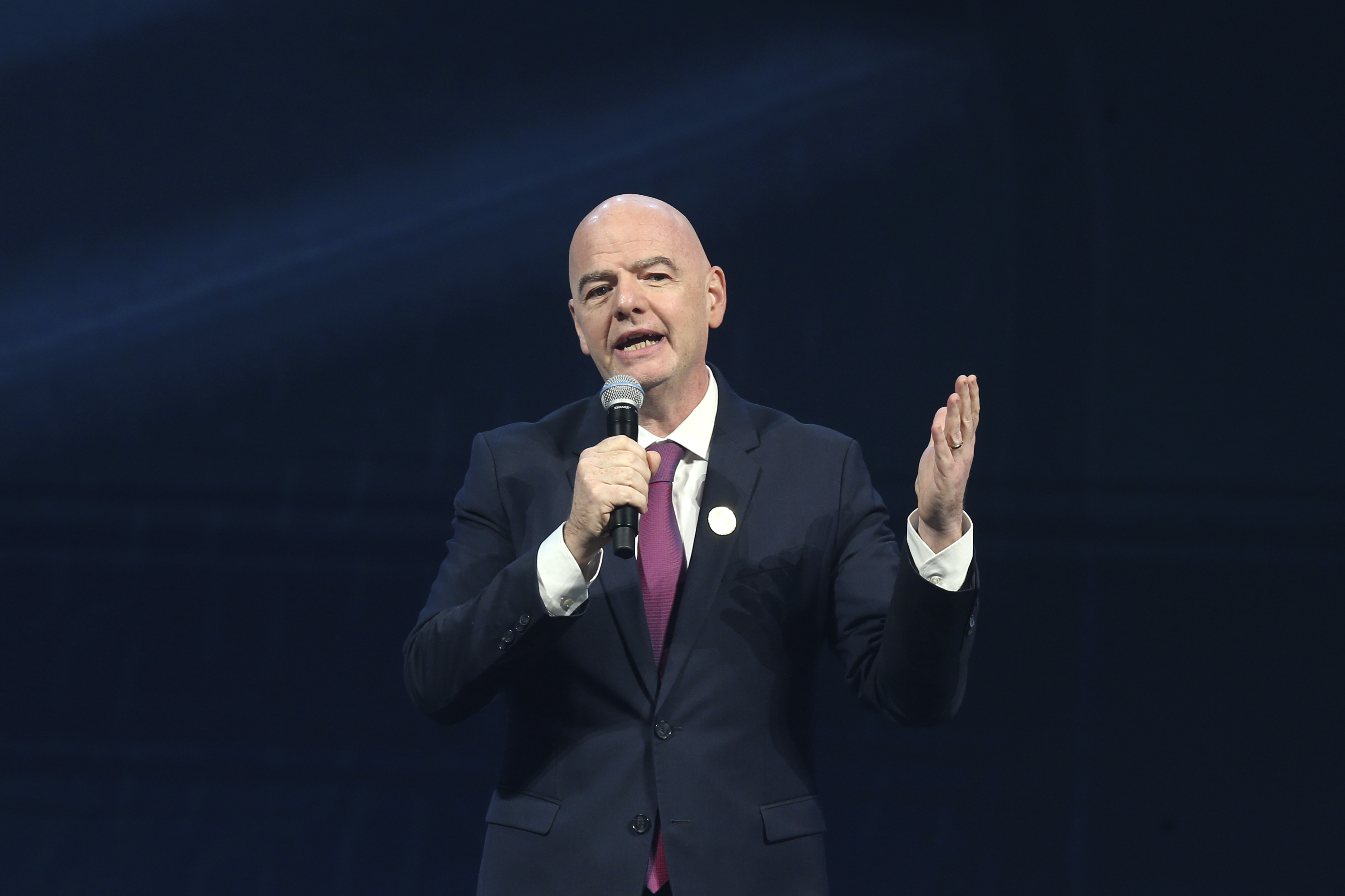 FIFA president Gianni Infantino delivers his speech before the FIFA Football Awards 2024 in Doha, Qatar, Tuesday, Dec. 17, 2024. (AP Photo/Hussein Sayed)