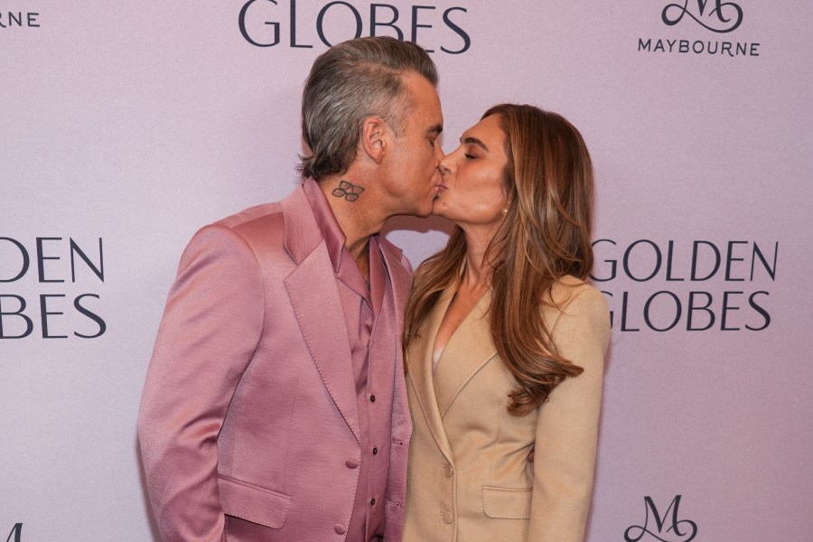 Robbie Williams, left, and Ayda Field Williams arrive at the Golden Globes first-time nominee celebration on Tuesday, Dec. 17, 2024, at The Maybourne Beverly Hills in Beverly Hills, Calif. (AP Photo/Chris Pizzello)