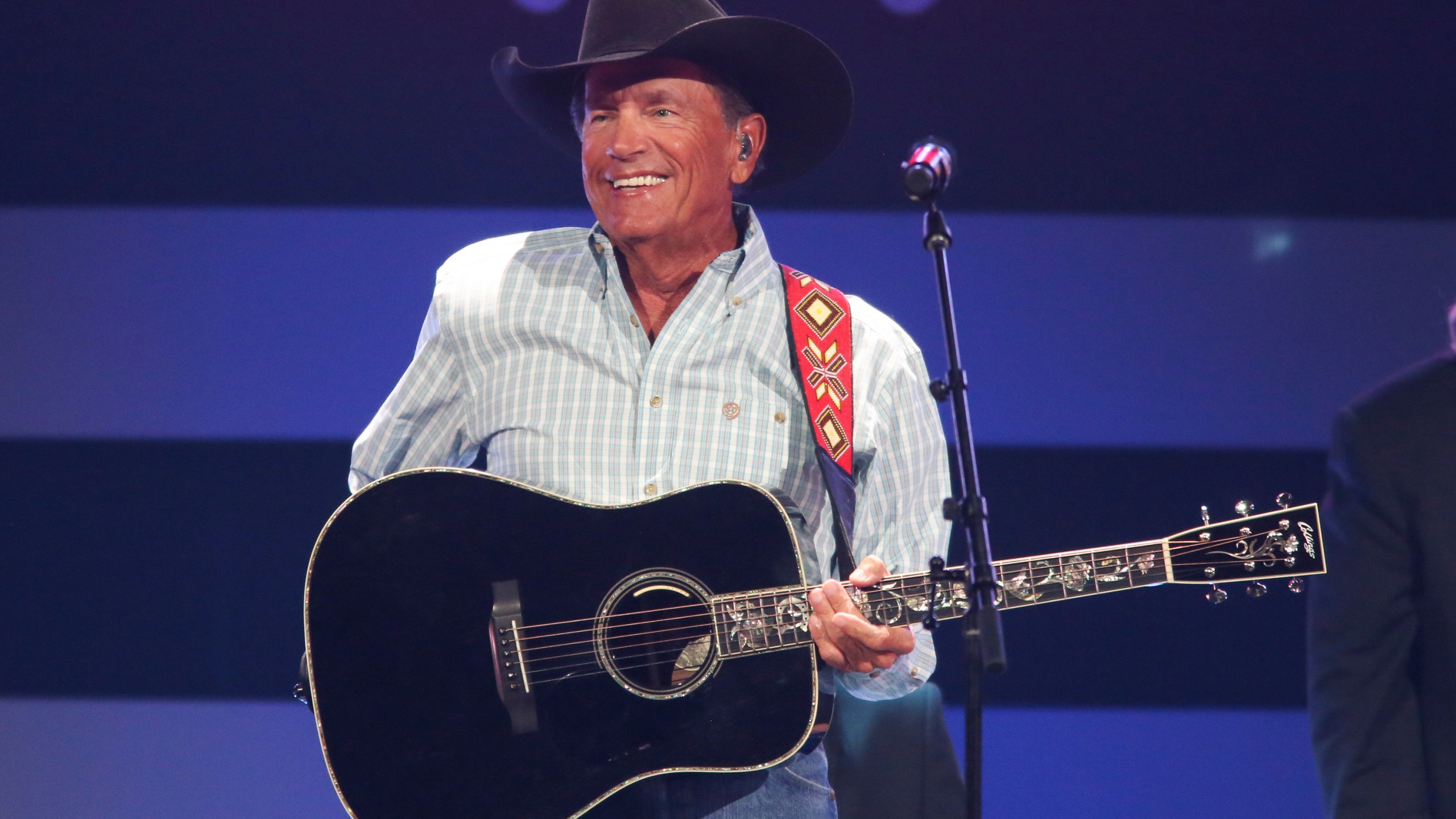 FILE - George Strait performs at the iHeartCountry Festival on Saturday, Oct. 30, 2021, at the Frank Erwin Center in Austin, Texas. (Photo by Jack Plunkett/Invision/AP, File)